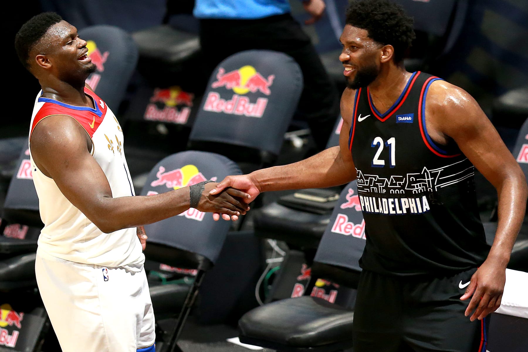 NEW ORLEANS, LOUISIANA - APRIL 09: Zion Williamson #1 of the New Orleans Pelicans and Joel Embiid #21 of the Philadelphia 76ers shake hands after an NBA game at Smoothie King Center on April 09, 2021 in New Orleans, Louisiana. NOTE TO USER: User expressly acknowledges and agrees that, by downloading and or using this photograph, User is consenting to the terms and conditions of the Getty Images License Agreement. (Photo by Sean Gardner/Getty Images)