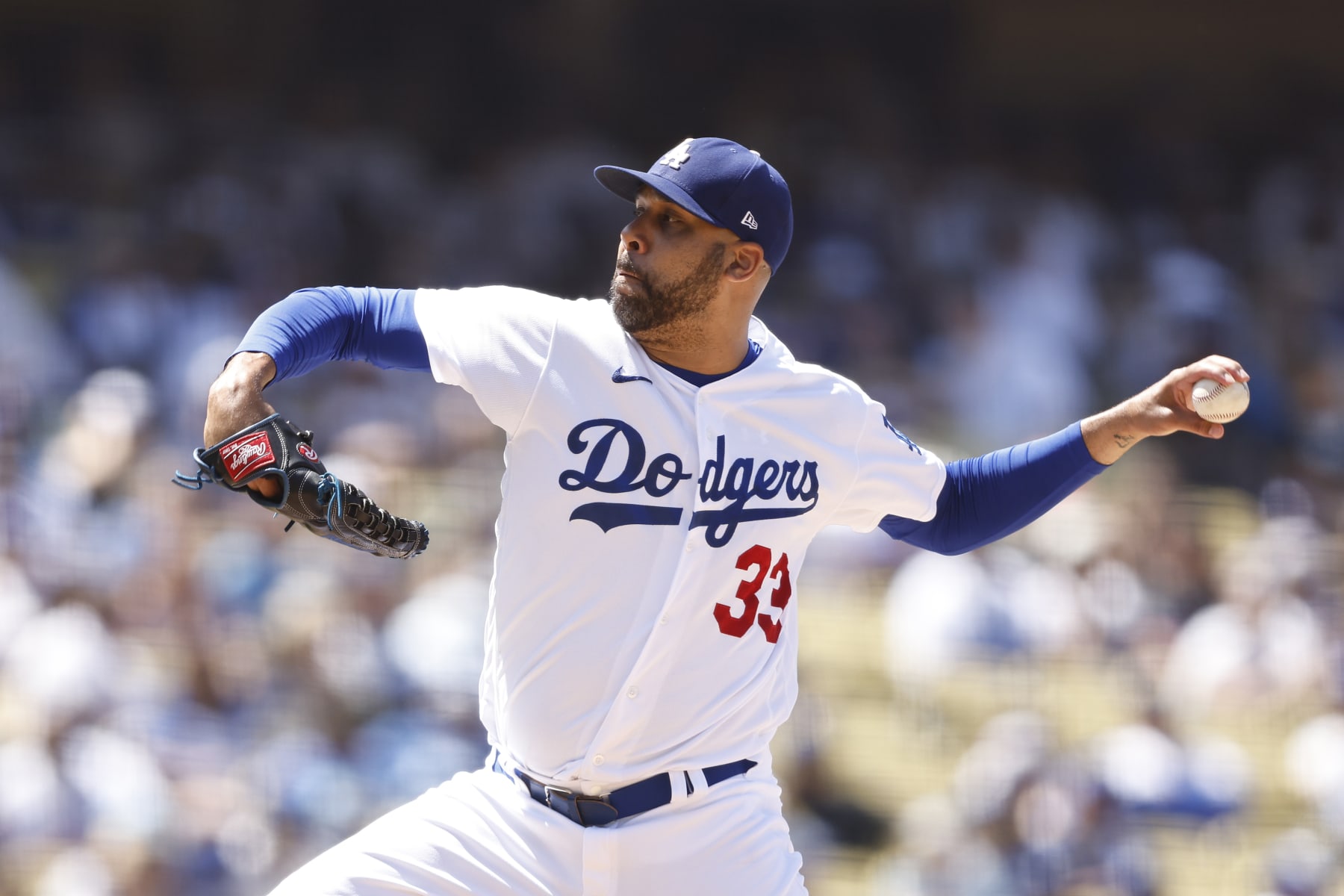 LOS ANGELES, CALIFORNIA - JULY 27: David Price #33 of the Los Angeles Dodgers pitches against the Washington Nationals during the eighth inning at Dodger Stadium on July 27, 2022 in Los Angeles, California. (Photo by Michael Owens/Getty Images)