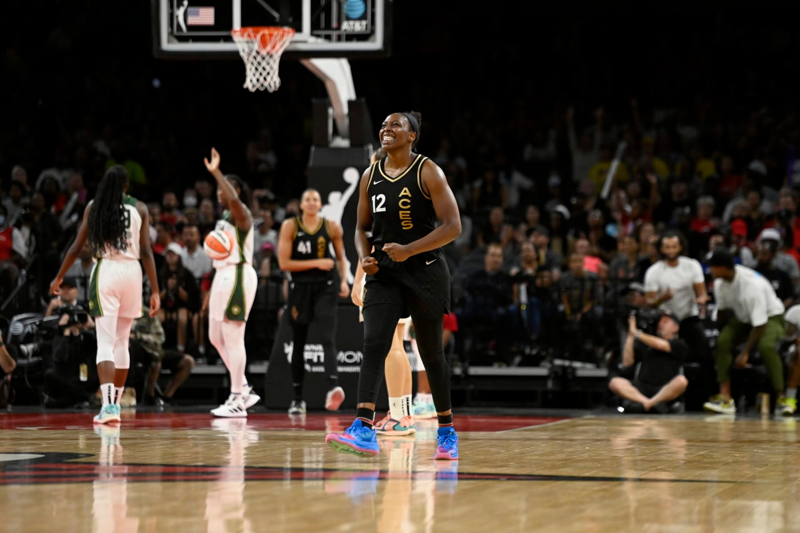 LAS VEGAS, NV - AUGUST 14: Chelsea Gray #12 of the Las Vegas Aces celebrates during the game against the Seattle Storm on August 14, 2022 at Michelob ULTRA Arena in Las Vegas, Nevada. NOTE TO USER: User expressly acknowledges and agrees that, by downloading and or using this photograph, User is consenting to the terms and conditions of the Getty Images License Agreement. Mandatory Copyright Notice: Copyright 2022 NBAE (Photo by David Becker/NBAE via Getty Images) LAS VEGAS, NV - AUGUST 14: Chelsea Gray #12 of the Las Vegas Aces celebrates during the game against the Seattle Storm on August 14, 2022 at Michelob ULTRA Arena in Las Vegas, Nevada. NOTE TO USER: User expressly acknowledges and agrees that, by downloading and or using this photograph, User is consenting to the terms and conditions of the Getty Images License Agreement. Mandatory Copyright Notice: Copyright 2022 NBAE (Photo by David Becker/NBAE via Getty Images)