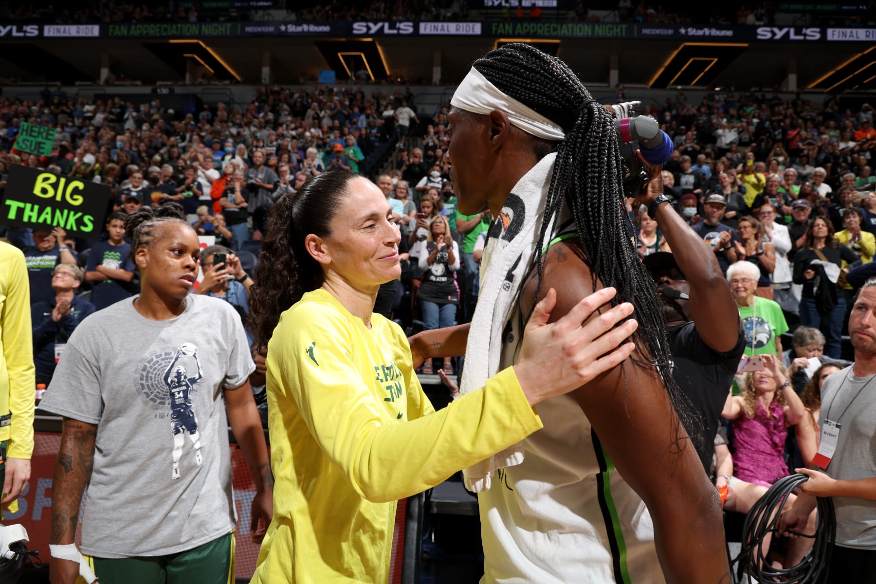 MINNEAPOLIS, MN - AUGUST 12: Sue Bird #10 of the Seattle Storm embraces Sylvia Fowles #34 of the Minnesota Lynx after the game on August 12, 2022 at the Target Center in Minneapolis, Minnesota. NOTE TO USER: User expressly acknowledges and agrees that, by downloading and or using this photograph, User is consenting to the terms and conditions of the Getty Images License Agreement. Mandatory Copyright Notice: Copyright 2022 NBAE (Photo by David Sherman/NBAE via Getty Images)