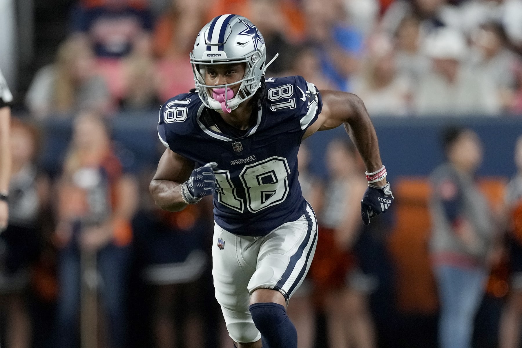 Dallas Cowboys wide receiver Jalen Tolbert (18) lines up against the Denver Broncos during the first half of an NFL preseason football game, Saturday, Aug. 13, 2022, in Denver. (AP Photo/David Zalubowski)