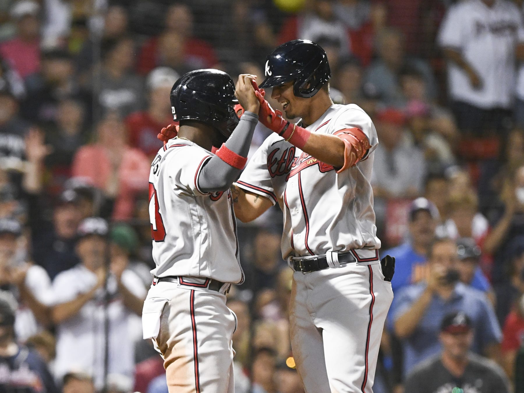 BOSTON, MASSACHUSETTS - AUGUST 10: Vaughn Grissom #18 of the Atlanta Braves celebrates with Michael Harris II #23 after hitting a two-run home run against the Boston Red Sox during the seventh inning at Fenway Park on August 10, 2022 in Boston, Massachusetts. (Photo by Brian Fluharty/Getty Images)