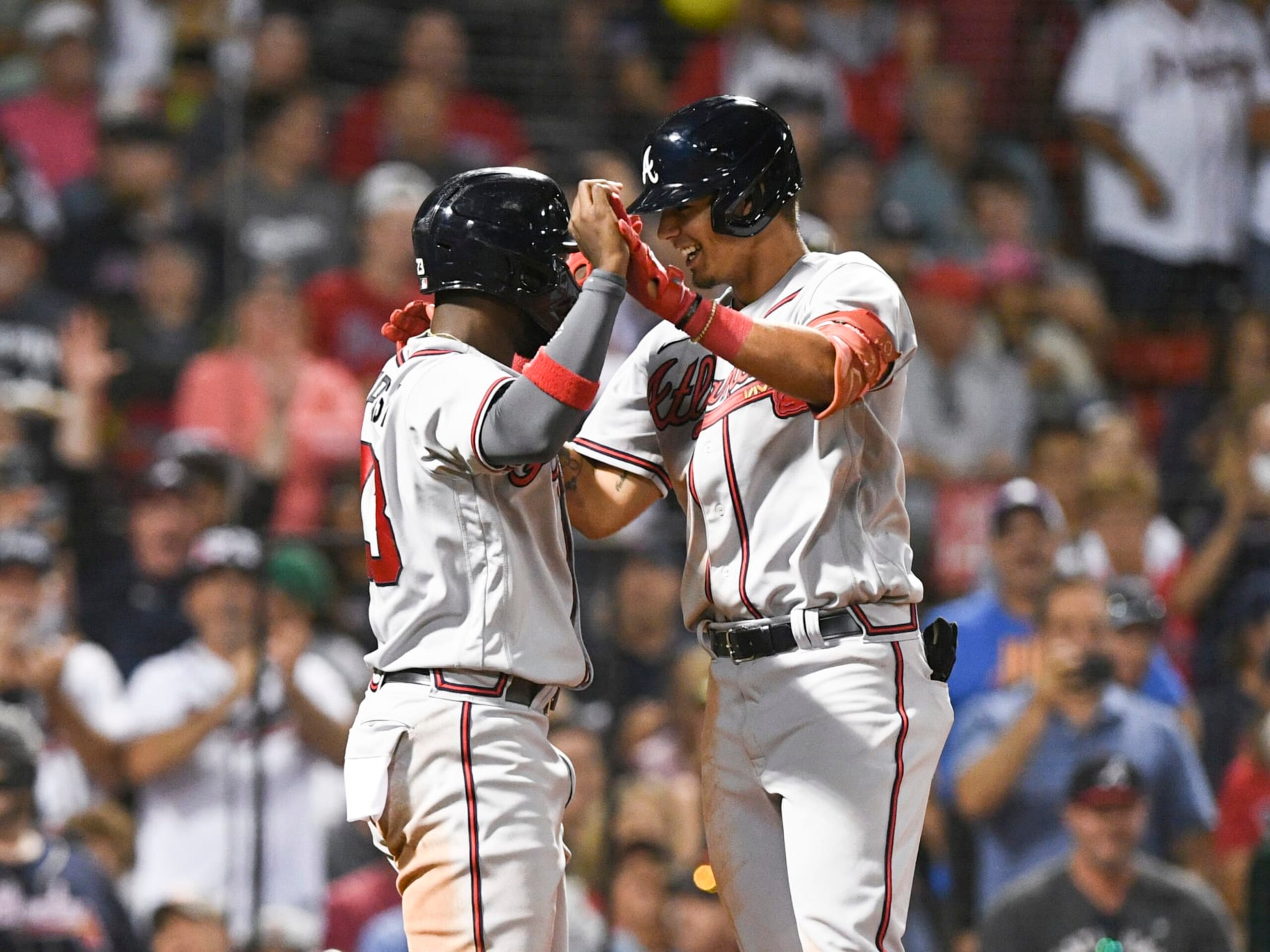 BOSTON, MASSACHUSETTS - AUGUST 10: Vaughn Grissom #18 of the Atlanta Braves celebrates with Michael Harris II #23 after hitting a two-run home run against the Boston Red Sox during the seventh inning at Fenway Park on August 10, 2022 in Boston, Massachusetts. (Photo by Brian Fluharty/Getty Images)