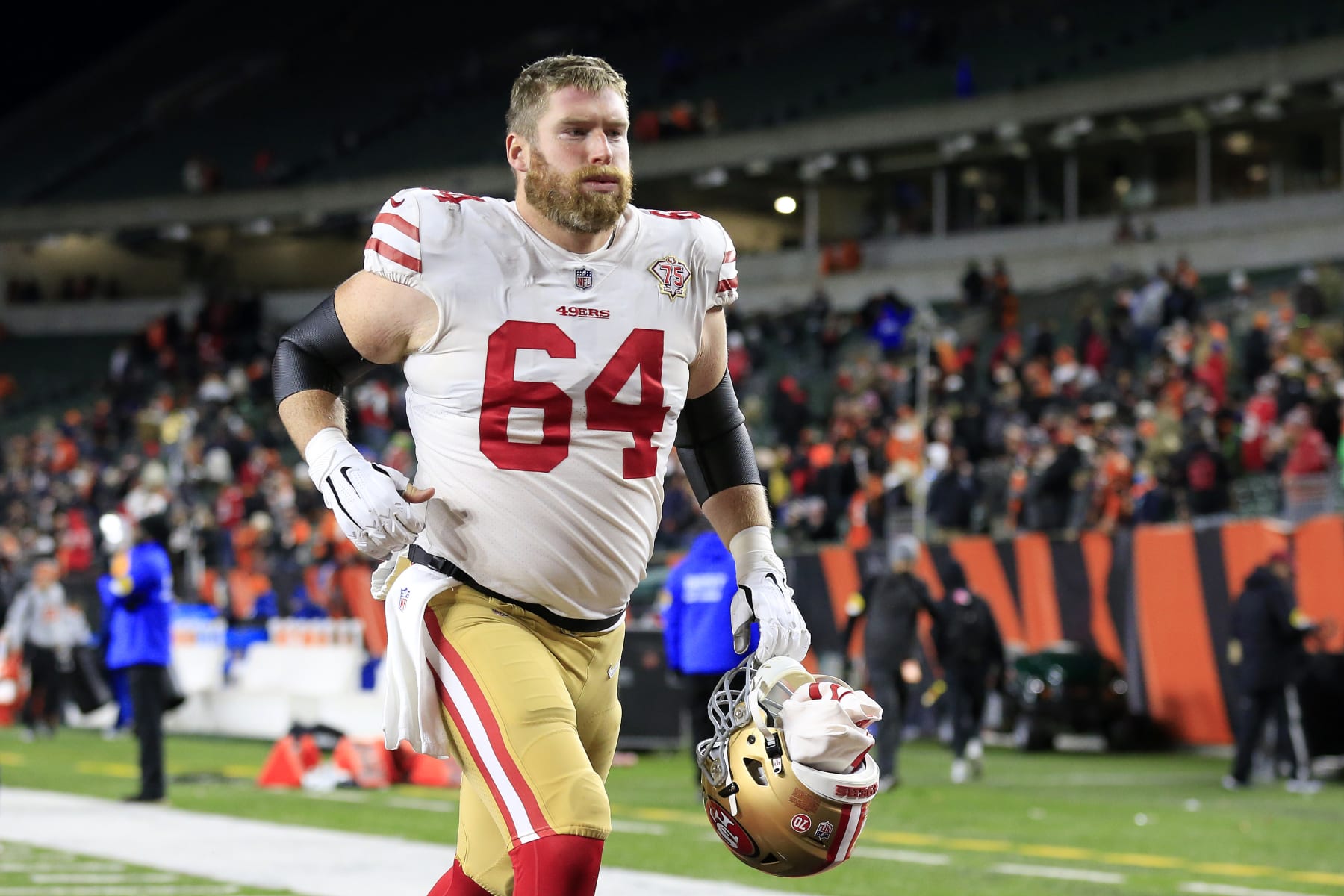 CINCINNATI, OHIO - DECEMBER 12: Jake Brendel #64 of the San Francisco 49ers walks off the field after a win over the Cincinnati Bengals at Paul Brown Stadium on December 12, 2021 in Cincinnati, Ohio. (Photo by Justin Casterline/Getty Images)