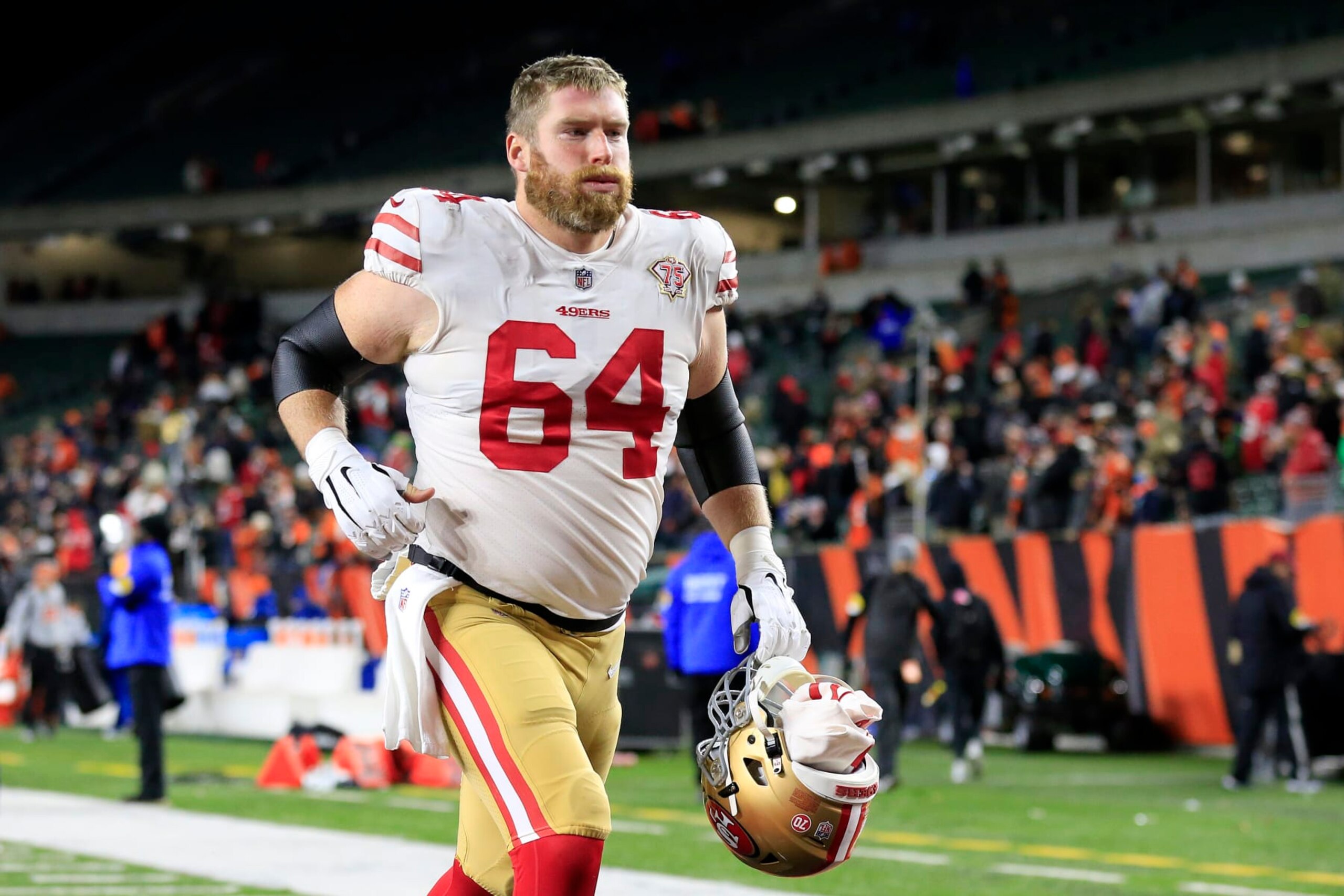 CINCINNATI, OHIO - DECEMBER 12: Jake Brendel #64 of the San Francisco 49ers walks off the field after a win over the Cincinnati Bengals at Paul Brown Stadium on December 12, 2021 in Cincinnati, Ohio. (Photo by Justin Casterline/Getty Images)