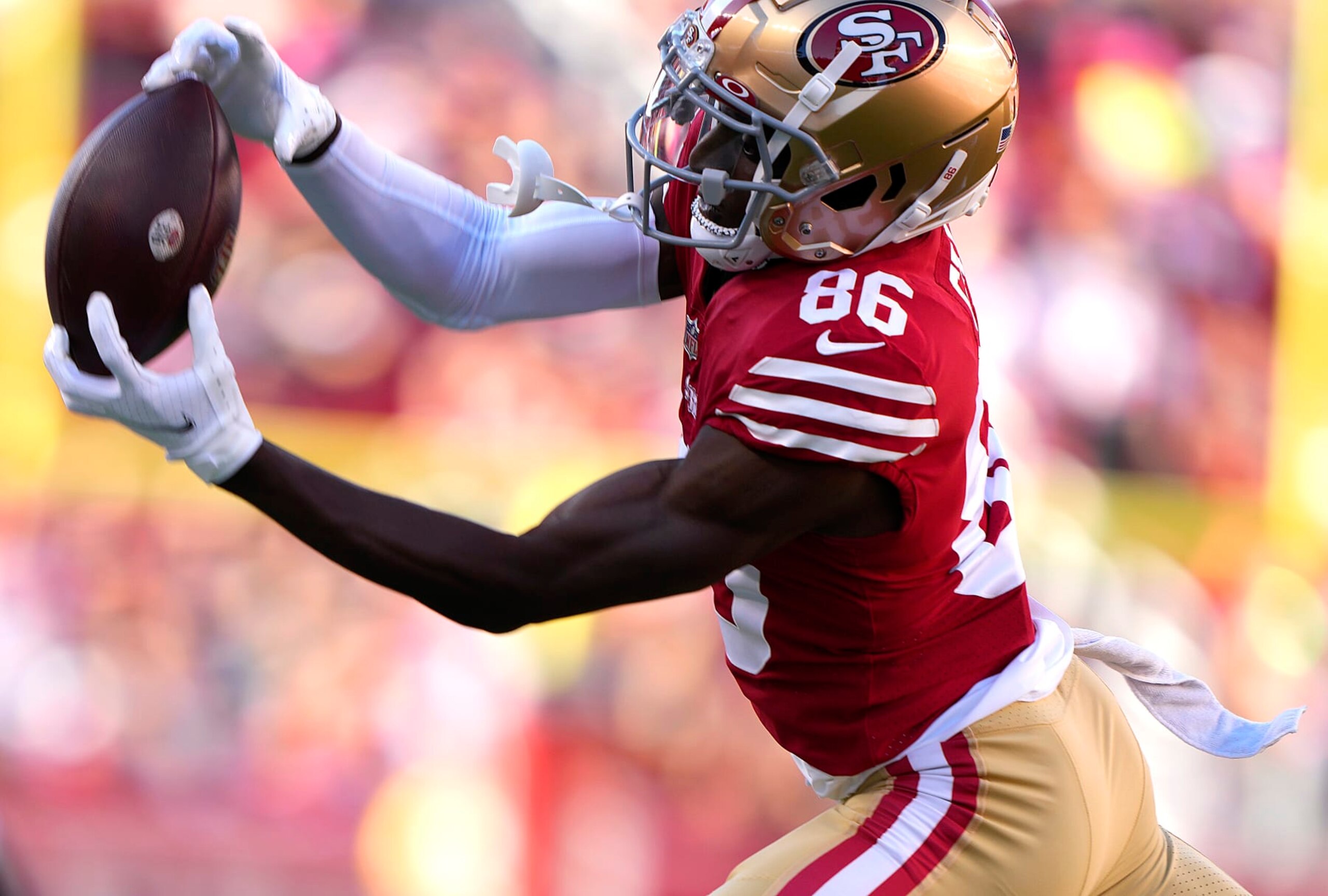 SANTA CLARA, CALIFORNIA - AUGUST 12: Danny Gray #86 of the San Francisco 49ers catches a pass against the Green Bay Packers during the first quarter of an NFL preseason game at Levi's Stadium on August 12, 2022 in Santa Clara, California. (Photo by Thearon W. Henderson/Getty Images)