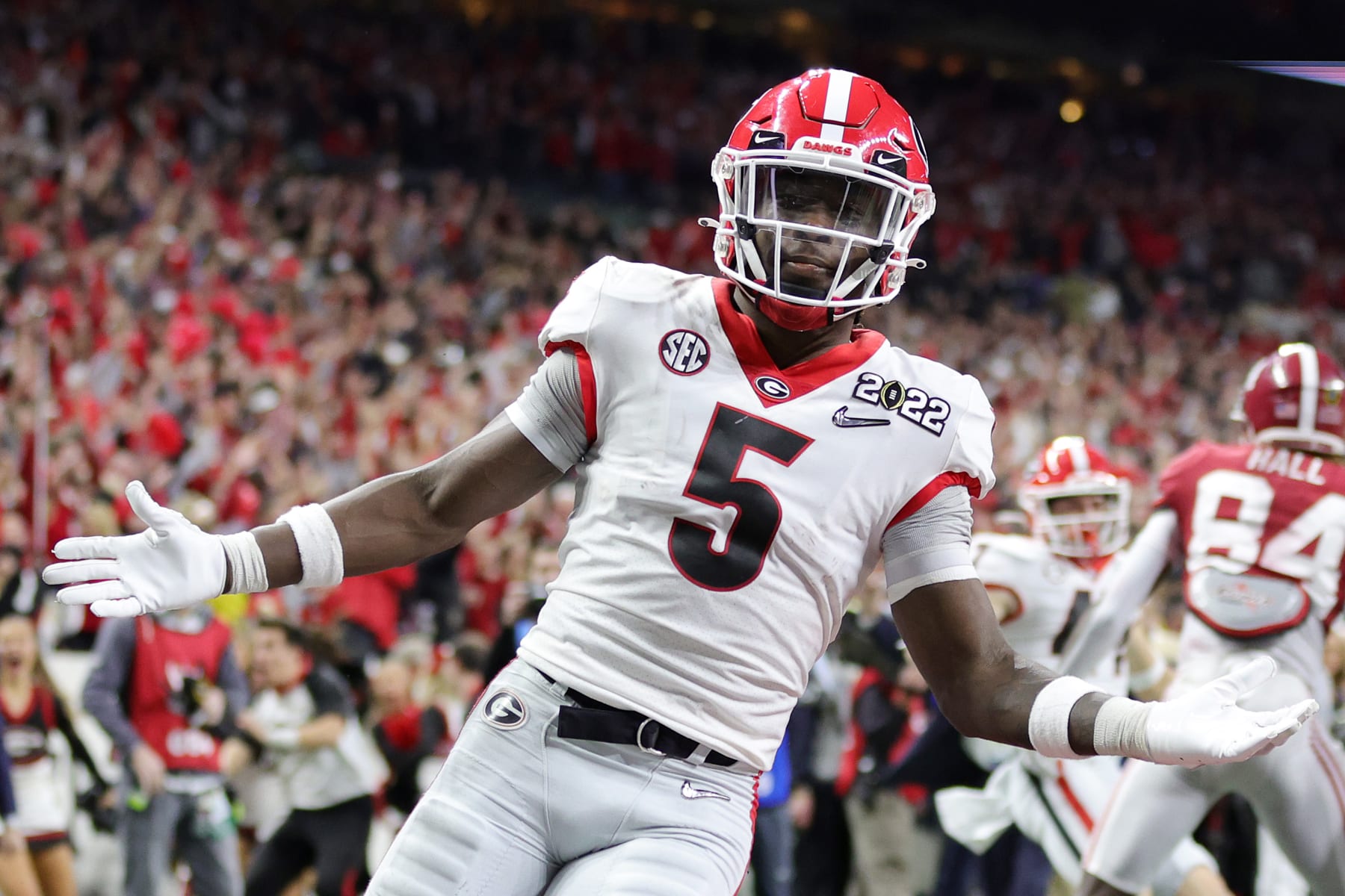 INDIANAPOLIS, INDIANA - JANUARY 10: Kelee Ringo #5 of the Georgia Bulldogs celebrates after getting an interception and scoring a touchdown in the fourth quarter of the game against the Alabama Crimson Tide during the 2022 CFP National Championship Game at Lucas Oil Stadium on January 10, 2022 in Indianapolis, Indiana. (Photo by Carmen Mandato/Getty Images)