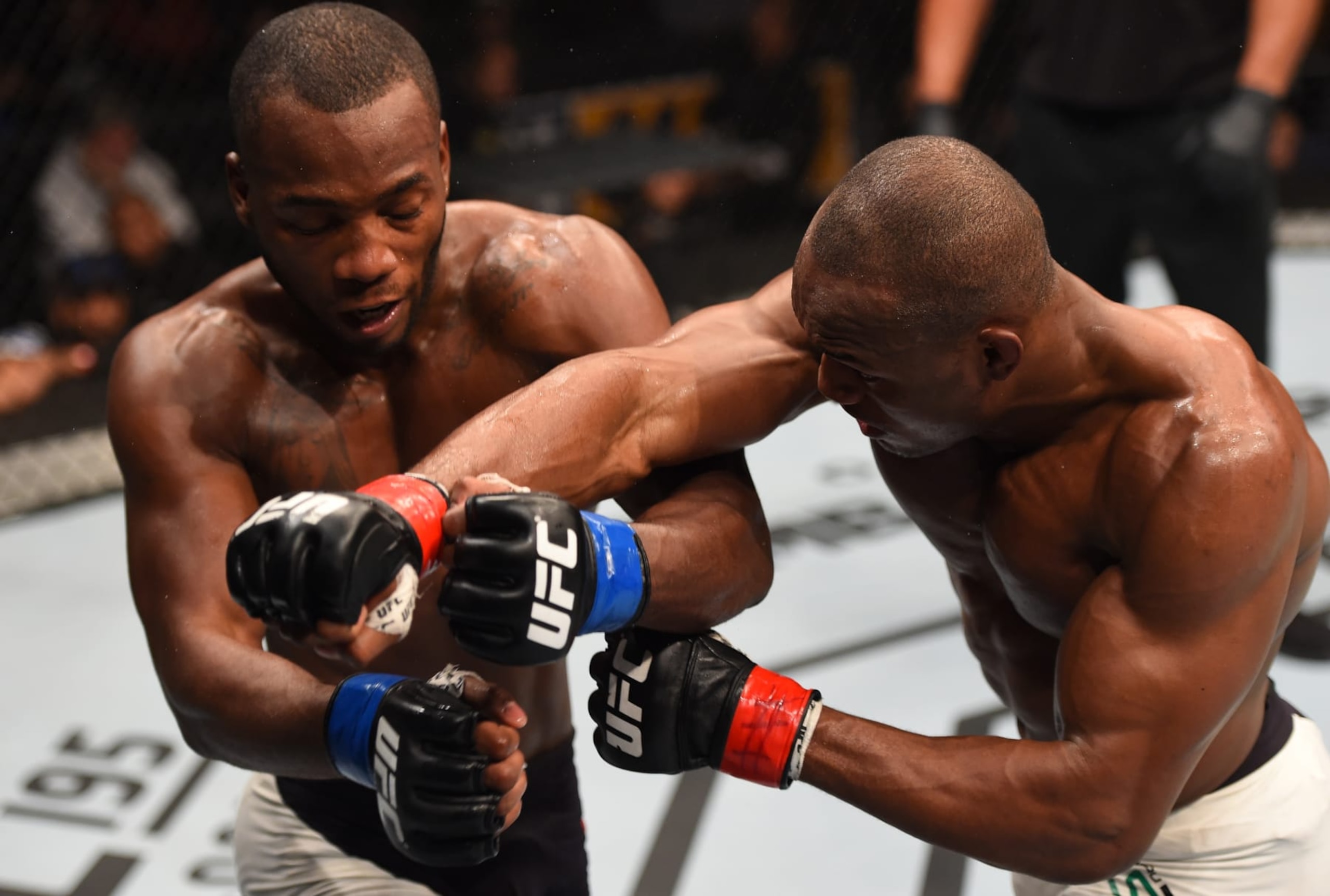 ORLANDO, FL - DECEMBER 19: (R-L) Kamaru Usman punches Leon Edwards in their welterweight bout during the UFC Fight Night event at the Amway Center on December 19, 2015 in Orlando, Florida. (Photo by Josh Hedges/Zuffa LLC/Zuffa LLC via Getty Images) ORLANDO, FL - DECEMBER 19: (R-L) Kamaru Usman punches Leon Edwards in their welterweight bout during the UFC Fight Night event at the Amway Center on December 19, 2015 in Orlando, Florida. (Photo by Josh Hedges/Zuffa LLC/Zuffa LLC via Getty Images)