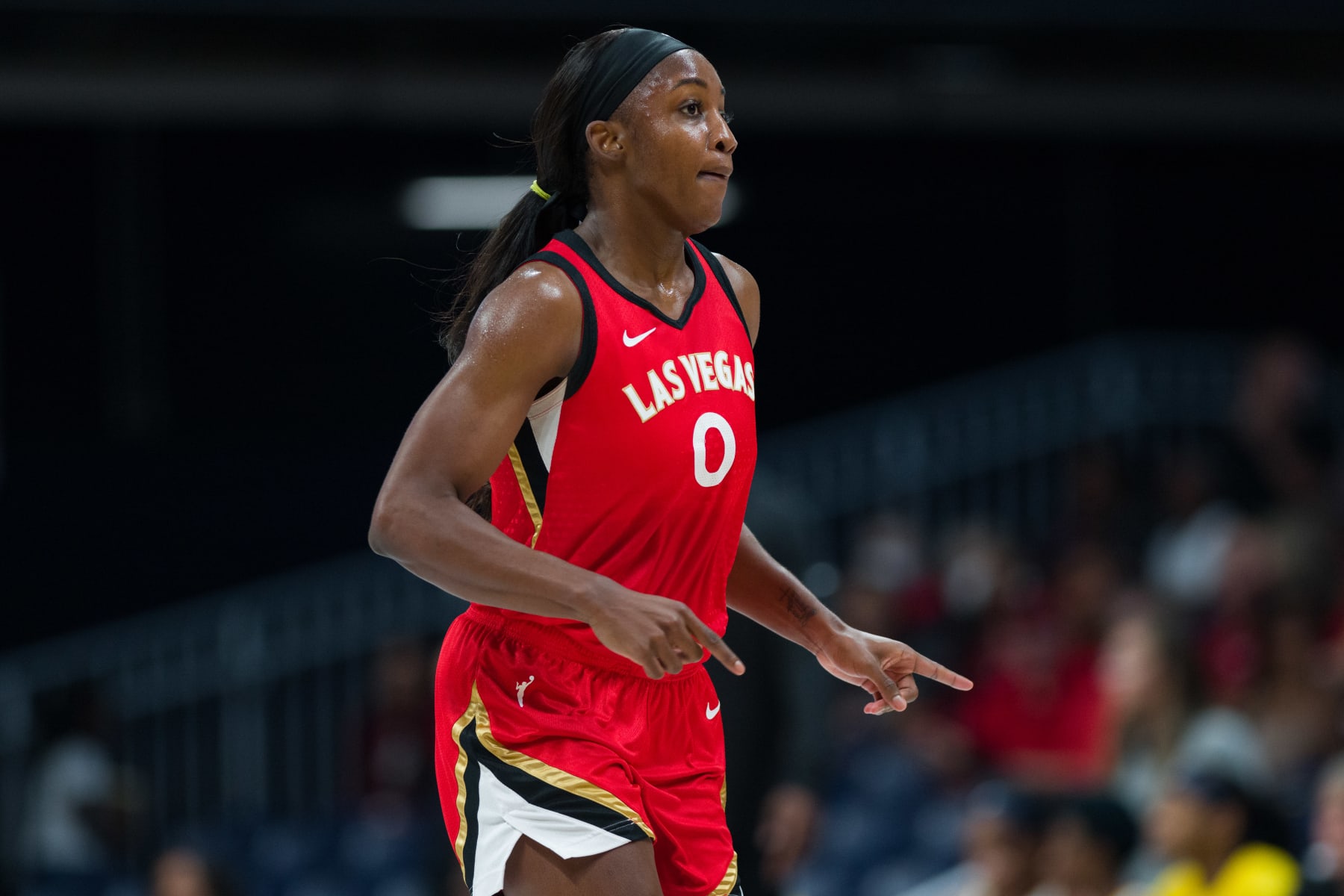 INDIANAPOLIS, IN - JULY 31: Las Vegas Aces guard Jackie Young (0) runs to the sidelines during the Indiana Fever vs Las Vegas Aces WNBA game on July 31, 2022 at Hinkle Fieldhouse in Indianapolis, IN. (Photo by Zach Bolinger/Icon Sportswire via Getty Images)