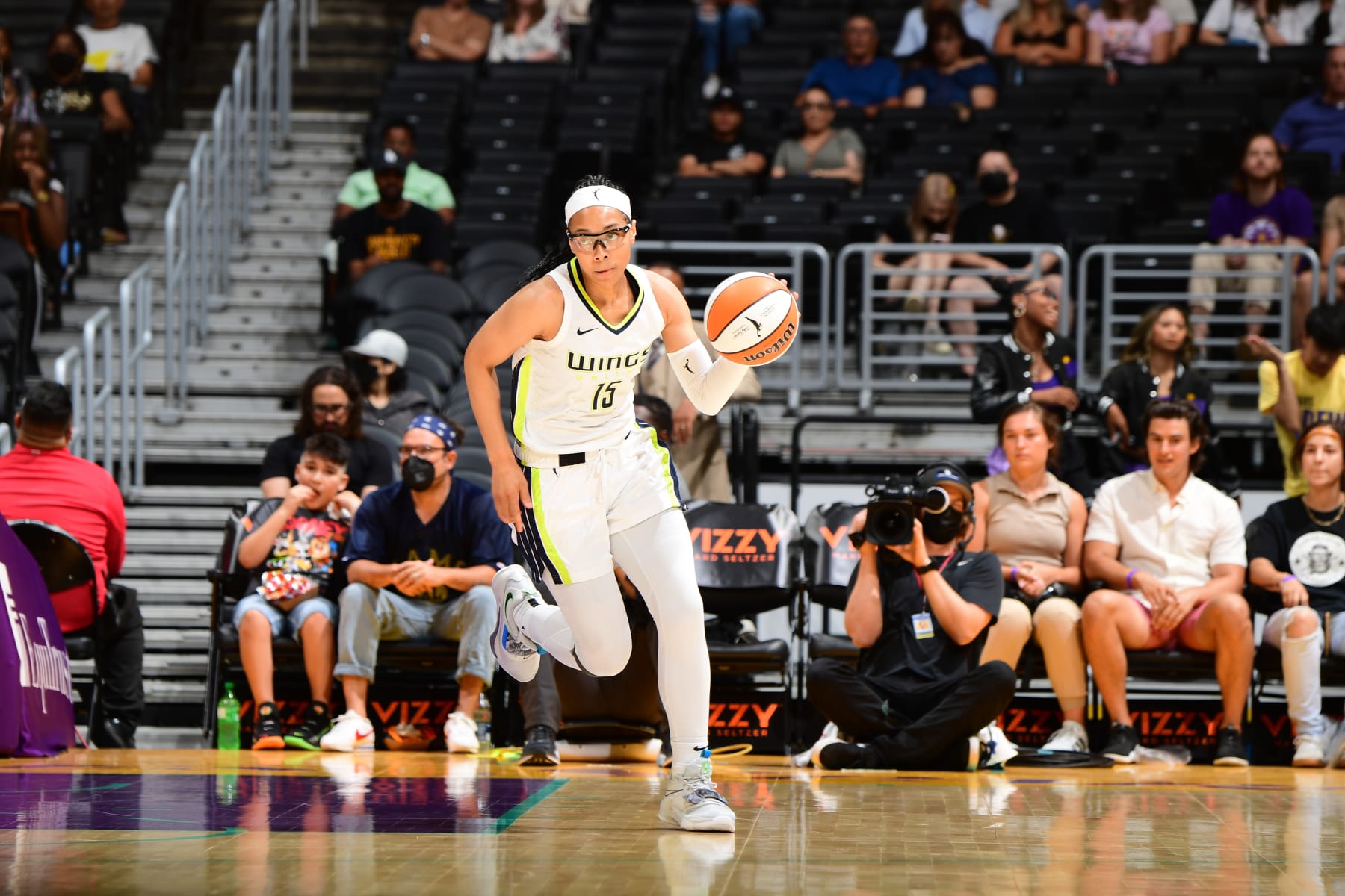 LOS ANGELES, CA - AUGUST 14: Allisha Gray #15 of the Dallas Wings dribbles the ball during the game against the Los Angeles Sparks on August 14, 2022 at Crypto.Com Arena in Los Angeles, California. NOTE TO USER: User expressly acknowledges and agrees that, by downloading and/or using this Photograph, user is consenting to the terms and conditions of the Getty Images License Agreement. Mandatory Copyright Notice: Copyright 2022 NBAE (Photo by Adam Pantozzi/NBAE via Getty Images)