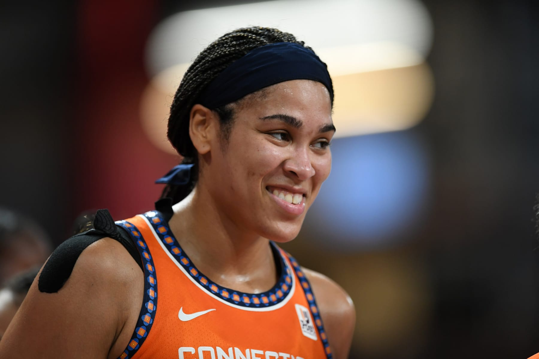 COLLEGE PARK, GA - JULY 15: Brionna Jones #42 of the Connecticut Sun smiles during the game against the Atlanta Dream on July 15, 2022 at Gateway Center Arena in College Park, Georgia.  NOTE TO USER: User expressly acknowledges and agrees that, by downloading and/or using this Photograph, user is consenting to the terms and conditions of the Getty Images License Agreement. Mandatory Copyright Notice: Copyright 2022 NBAE (Photo by Adam Hagy/NBAE via Getty Images)