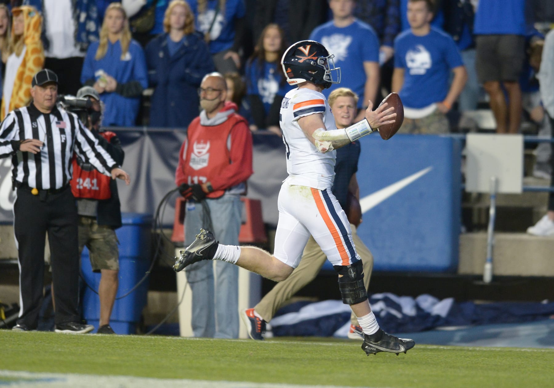 PROVO, UT - OCTOBER 30: Virginia Cavaliers quarterback Brennan Armstrong (5) runs for a touchdown during a game between the Virginia Cavaliers and BYU Cougars on October 30, 2021, at LaVell Edwards Stadium in Provo, Utah. (Photo by Boyd Ivey/Icon Sportswire via Getty Images)