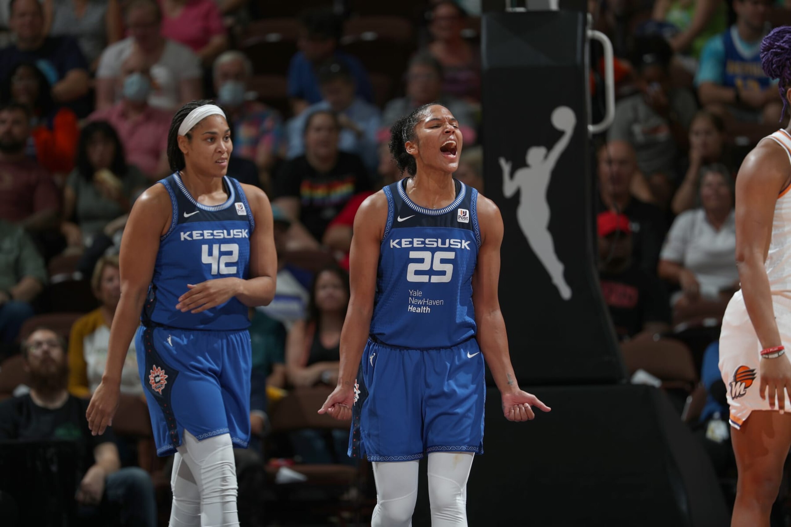 UNCASVILLE, CT - AUGUST 2: Alyssa Thomas #25 of the Connecticut Sun reacts to a play during the game against the Phoenix Mercury on August 2, 2022 at Mohegan Sun Arena in Uncasville, Connecticut.  NOTE TO USER: User expressly acknowledges and agrees that, by downloading and/or using this Photograph, user is consenting to the terms and conditions of the Getty Images License Agreement. Mandatory Copyright Notice: Copyright 2022 NBAE (Photo by Chris Marion/NBAE via Getty Images)