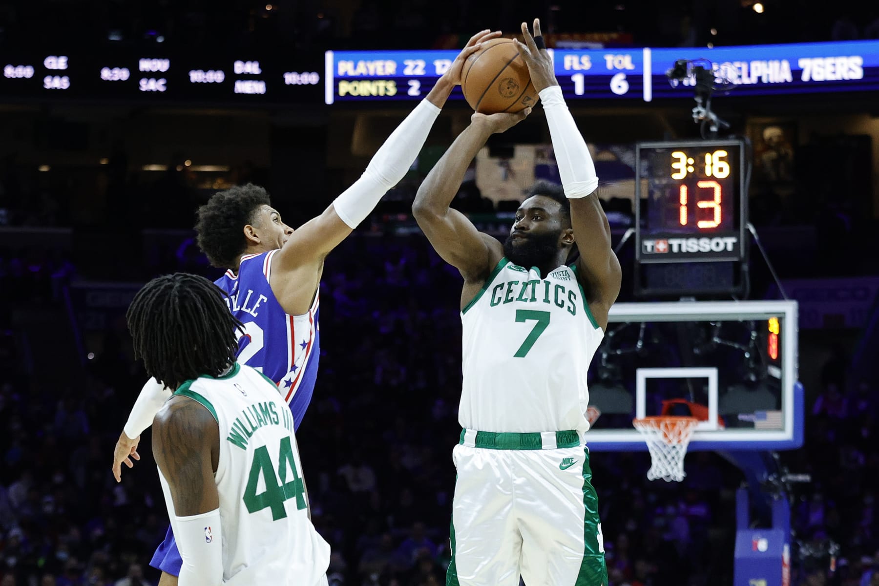 PHILADELPHIA, PENNSYLVANIA - JANUARY 14: Matisse Thybulle #22 of the Philadelphia 76ers blocks Jaylen Brown #7 of the Boston Celtics during the first quarter at Wells Fargo Center on January 14, 2022 in Philadelphia, Pennsylvania. NOTE TO USER: User expressly acknowledges and agrees that, by downloading and or using this photograph, User is consenting to the terms and conditions of the Getty Images License Agreement. (Photo by Tim Nwachukwu/Getty Images)