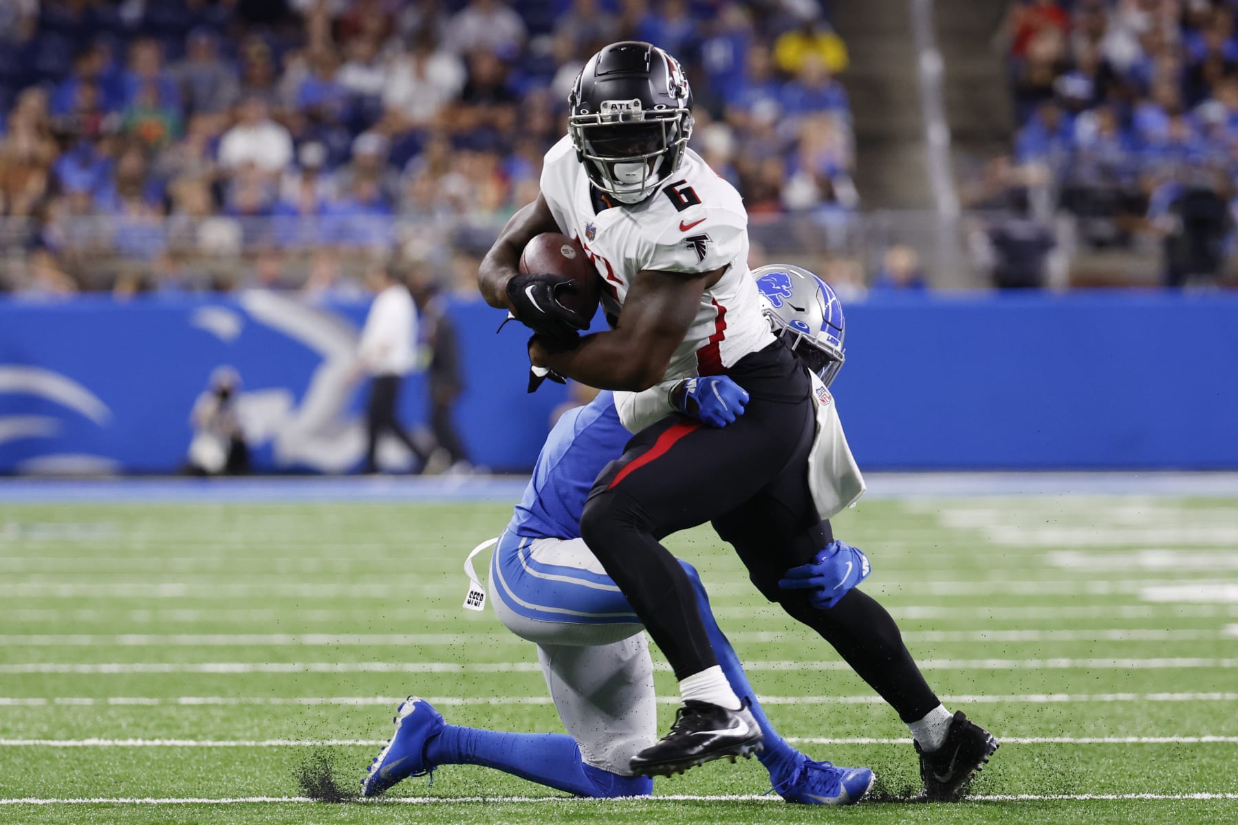 Atlanta Falcons running back Damien Williams (6) rushes in the first half against the Detroit Lions during an NFL football game, Friday, Aug. 12, 2022, in Detroit. (AP Photo/Rick Osentoski)