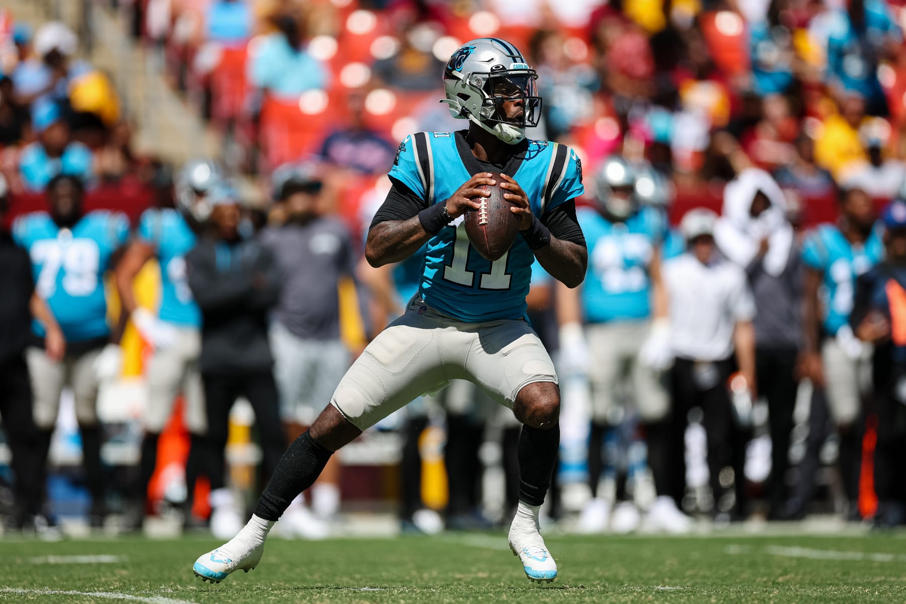 LANDOVER, MD - AUGUST 13: PJ Walker #11 of the Carolina Panthers looks to pass against the Washington Commanders during the second half of the preseason game at FedExField on August 13, 2022 in Landover, Maryland. (Photo by Scott Taetsch/Getty Images)
