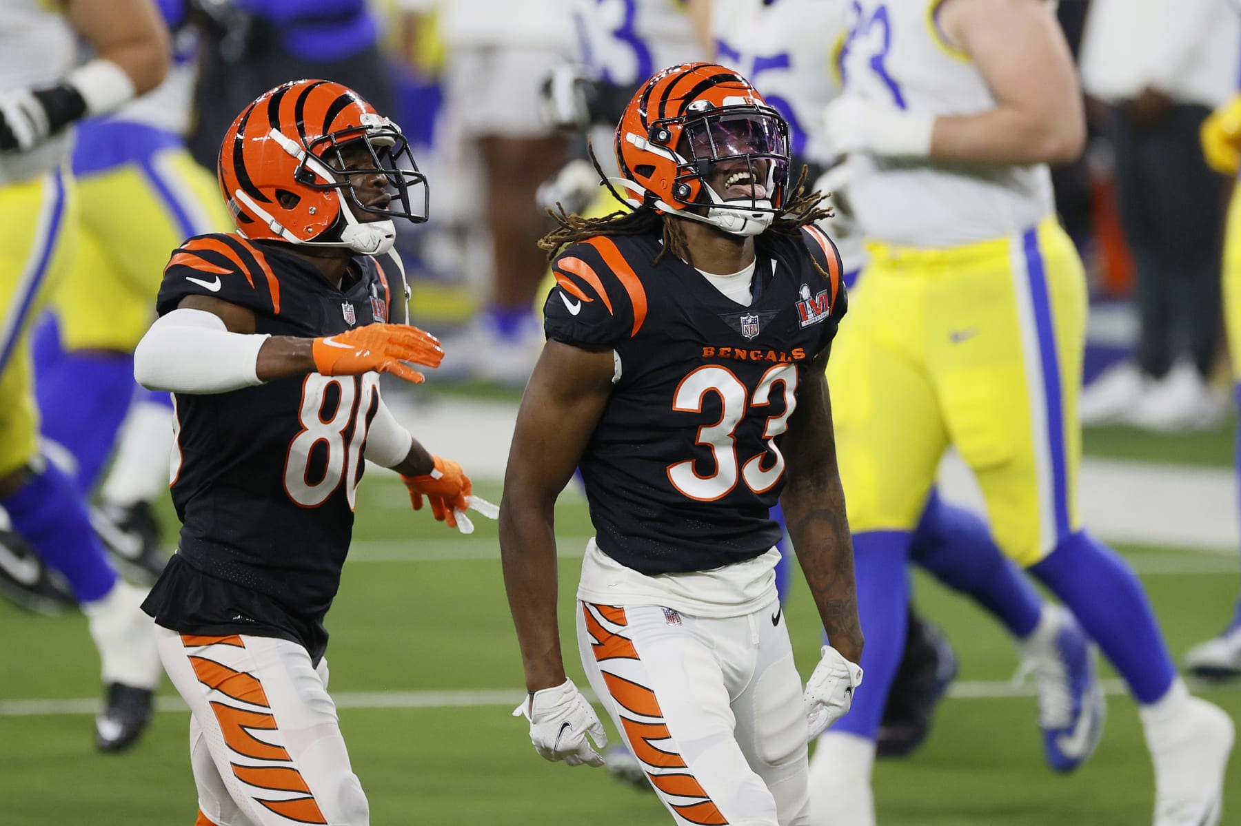 INGLEWOOD, CALIFORNIA - FEBRUARY 13: Tre Flowers #33 and Mike Thomas #80 of the Cincinnati Bengals react during Super Bowl LVI at SoFi Stadium on February 13, 2022 in Inglewood, California. The Los Angeles Rams defeated the Cincinnati Bengals 23-20.  (Photo by Steph Chambers/Getty Images)
