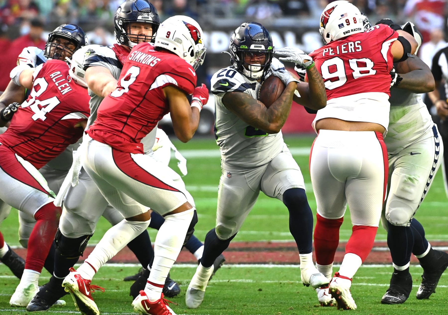 GLENDALE, ARIZONA - JANUARY 09: Rashaad Penny #20 of the Seattle Seahawks runs the ball during the second quarter against the Arizona Cardinals at State Farm Stadium on January 09, 2022 in Glendale, Arizona. (Photo by Norm Hall/Getty Images)