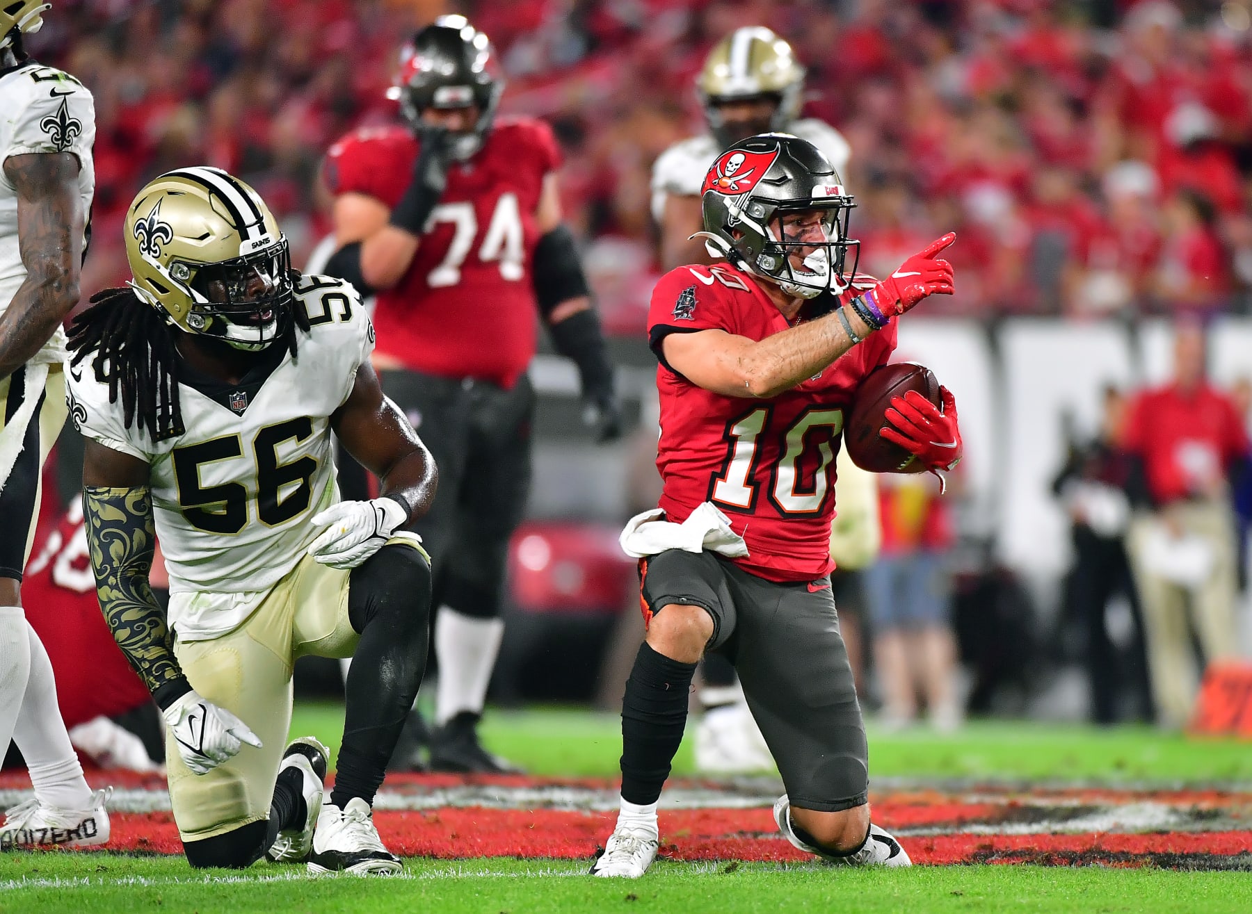 TAMPA, FLORIDA - DECEMBER 19:  Scott Miller #10 of the Tampa Bay Buccaneers gestures after a first down during the 2nd quarter of the game against the New Orleans Saints at Raymond James Stadium on December 19, 2021 in Tampa, Florida. (Photo by Julio Aguilar/Getty Images)