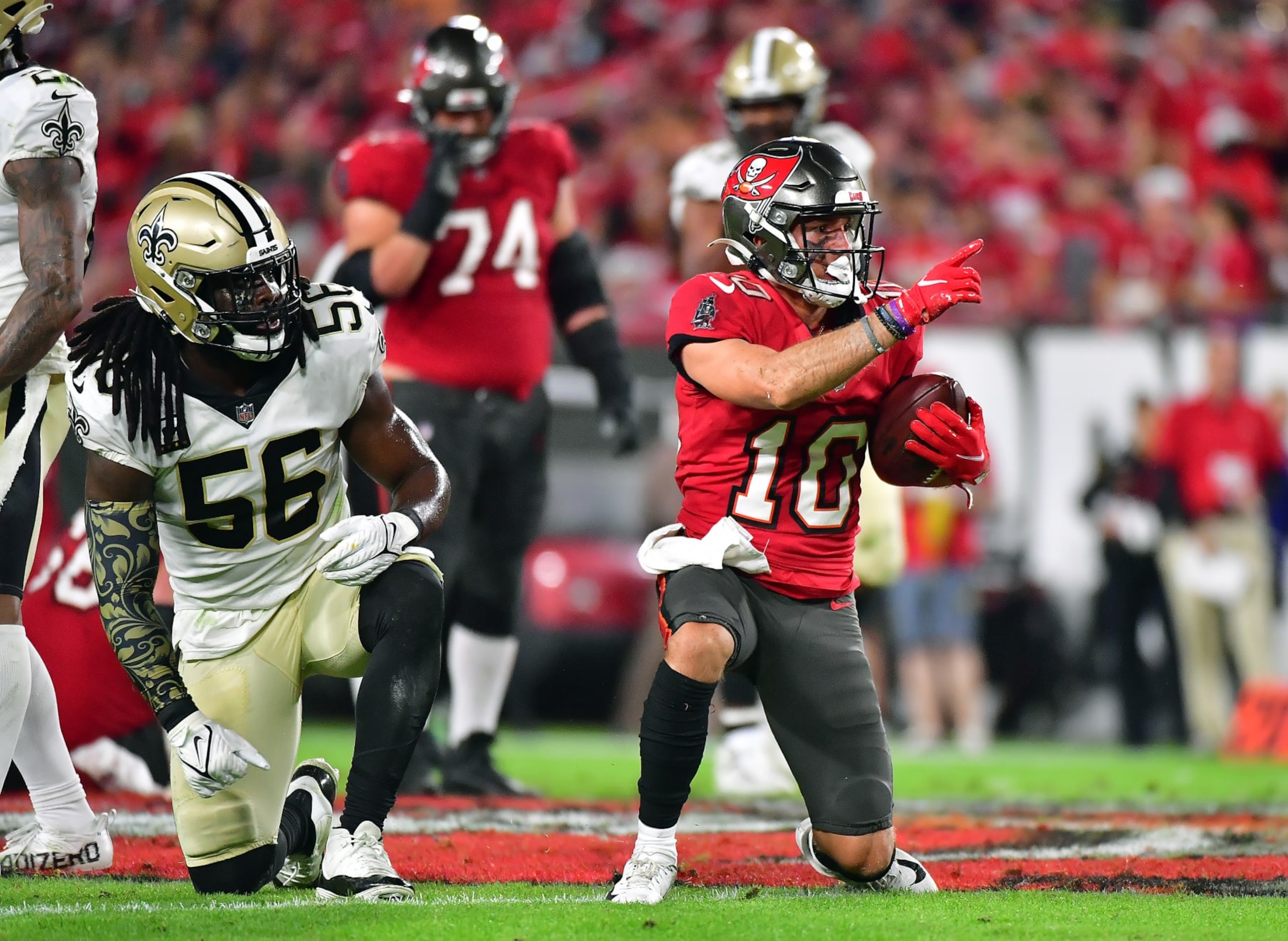 TAMPA, FLORIDA - DECEMBER 19:  Scott Miller #10 of the Tampa Bay Buccaneers gestures after a first down during the 2nd quarter of the game against the New Orleans Saints at Raymond James Stadium on December 19, 2021 in Tampa, Florida. (Photo by Julio Aguilar/Getty Images)