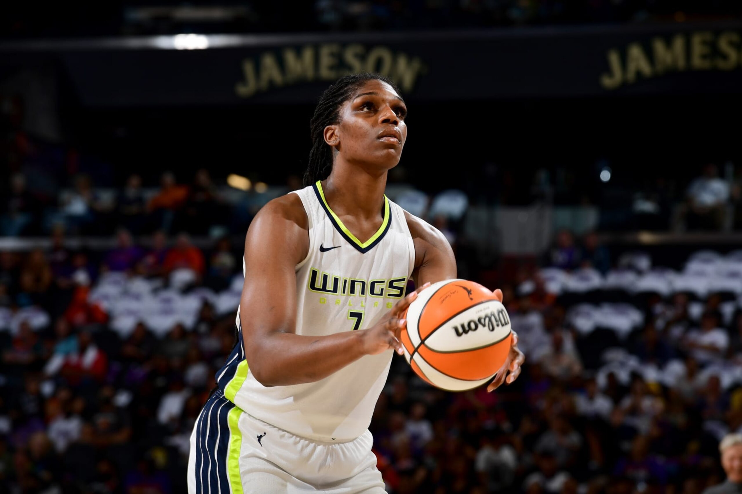 PHOENIX, AZ - AUGUST 12: Teaira McCowan #7 of the Dallas Wings prepares to shoot a free throw during the game against the Phoenix Mercury on August 12, 2022 at Footprint Center in Phoenix, Arizona. NOTE TO USER: User expressly acknowledges and agrees that, by downloading and or using this photograph, user is consenting to the terms and conditions of the Getty Images License Agreement. Mandatory Copyright Notice: Copyright 2022 NBAE (Photo by Kate Frese/NBAE via Getty Images)