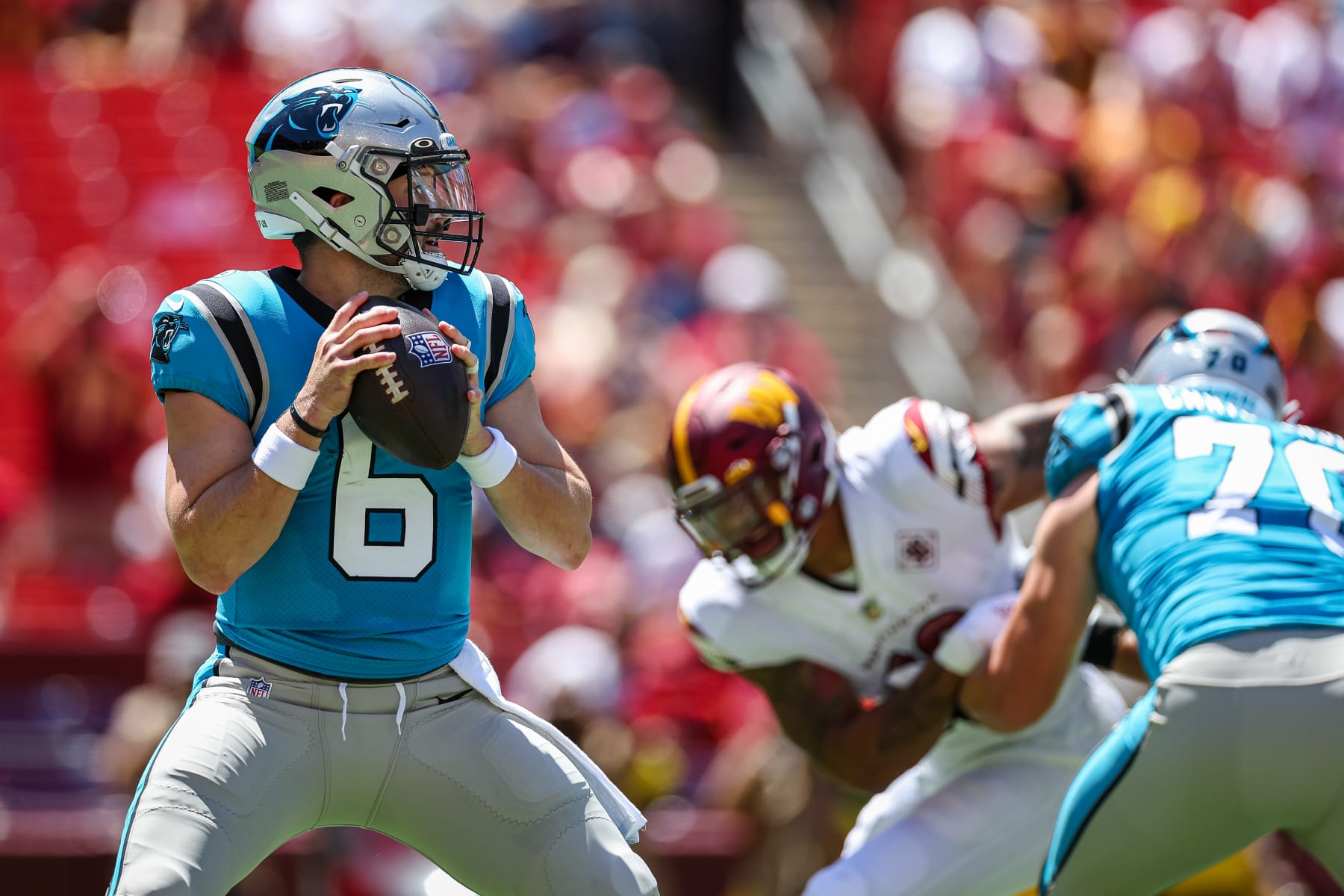 LANDOVER, MD - AUGUST 13: Baker Mayfield #6 of the Carolina Panthers looks to pass against the Washington Commanders during the first half of the preseason game at FedExField on August 13, 2022 in Landover, Maryland. (Photo by Scott Taetsch/Getty Images)