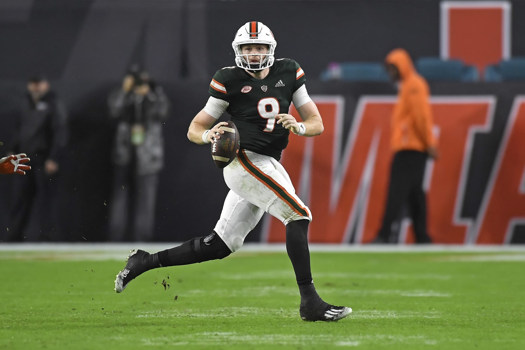 MIAMI GARDENS, FL - NOVEMBER 20: Miami quarterback Tyler Van Dyke (9) scrambles in the fourth quarter as the University of Miami Hurricanes faced the Virginia Tech Hokies on November 20, 2021, at Hard Rock Stadium in Miami Gardens, Florida. (Photo by Samuel Lewis/Icon Sportswire via Getty Images) MIAMI GARDENS, FL - NOVEMBER 20: Miami quarterback Tyler Van Dyke (9) scrambles in the fourth quarter as the University of Miami Hurricanes faced the Virginia Tech Hokies on November 20, 2021, at Hard Rock Stadium in Miami Gardens, Florida. (Photo by Samuel Lewis/Icon Sportswire via Getty Images)