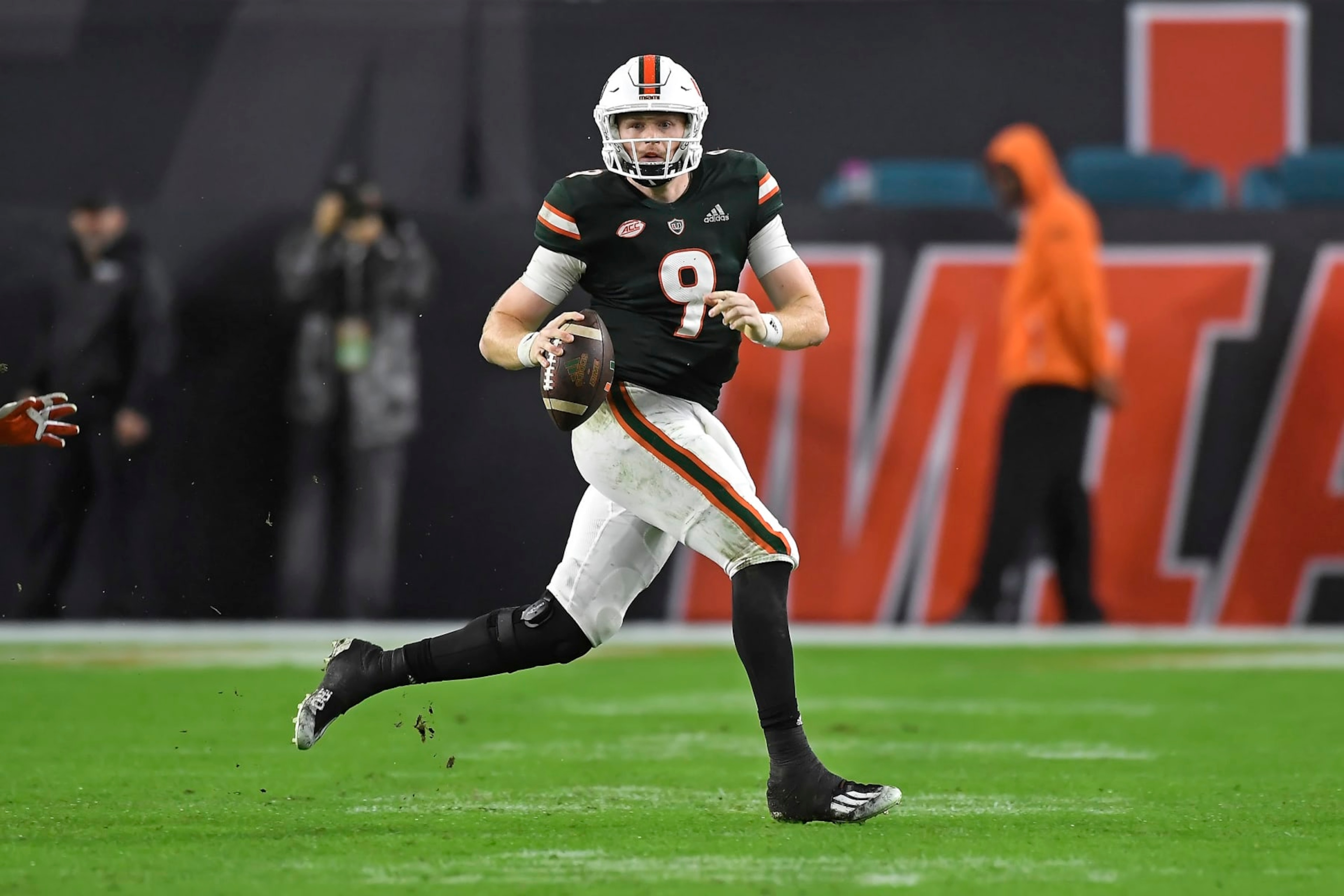 MIAMI GARDENS, FL - NOVEMBER 20: Miami quarterback Tyler Van Dyke (9) scrambles in the fourth quarter as the University of Miami Hurricanes faced the Virginia Tech Hokies on November 20, 2021, at Hard Rock Stadium in Miami Gardens, Florida. (Photo by Samuel Lewis/Icon Sportswire via Getty Images) MIAMI GARDENS, FL - NOVEMBER 20: Miami quarterback Tyler Van Dyke (9) scrambles in the fourth quarter as the University of Miami Hurricanes faced the Virginia Tech Hokies on November 20, 2021, at Hard Rock Stadium in Miami Gardens, Florida. (Photo by Samuel Lewis/Icon Sportswire via Getty Images)