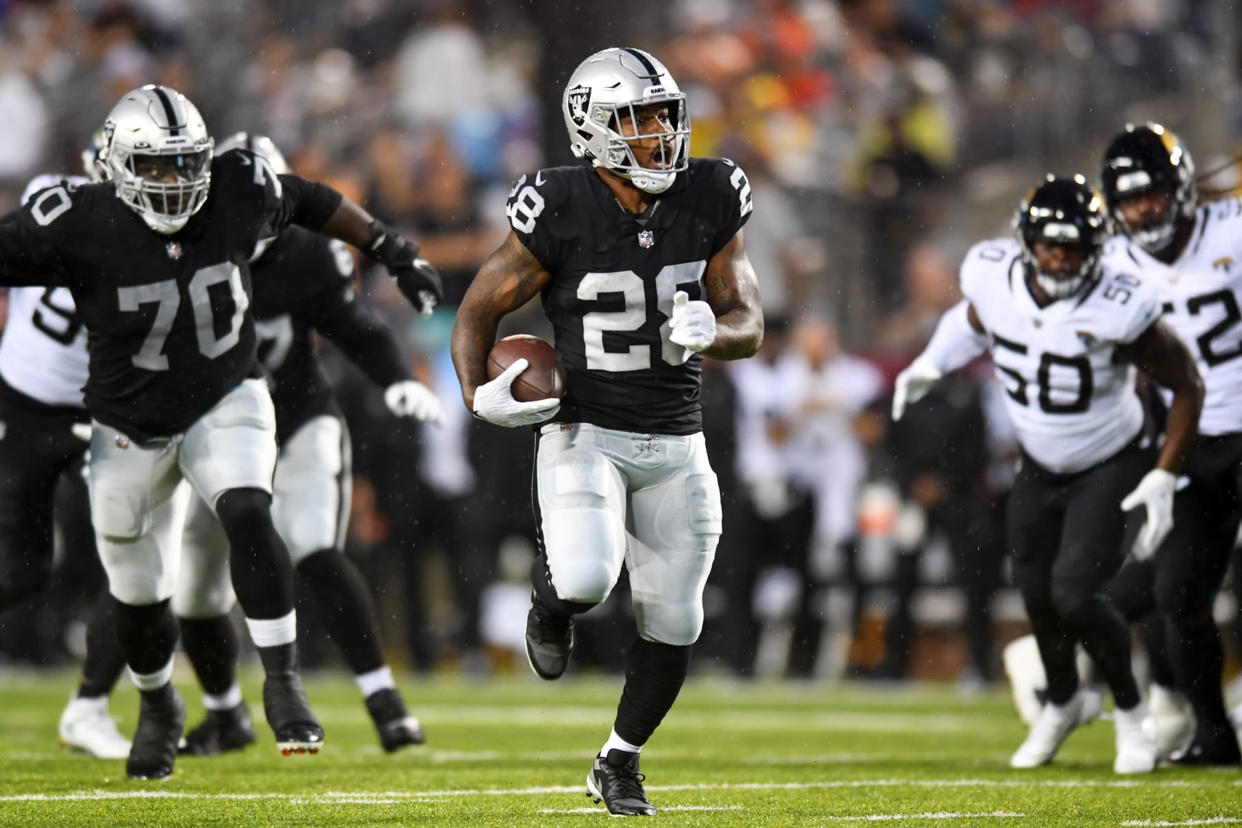 CANTON, OH - AUGUST 04: Josh Jacobs #28 of the Las Vegas Raiders carries the ball during the first half of the 2022 Pro Football Hall of Fame Game against the Jacksonville Jaguars at Tom Benson Hall of Fame Stadium on August 04, 2022 in Canton, Ohio. (Photo by Nick Cammett/Diamond Images via Getty Images) CANTON, OH - AUGUST 04: Josh Jacobs #28 of the Las Vegas Raiders carries the ball during the first half of the 2022 Pro Football Hall of Fame Game against the Jacksonville Jaguars at Tom Benson Hall of Fame Stadium on August 04, 2022 in Canton, Ohio. (Photo by Nick Cammett/Diamond Images via Getty Images)