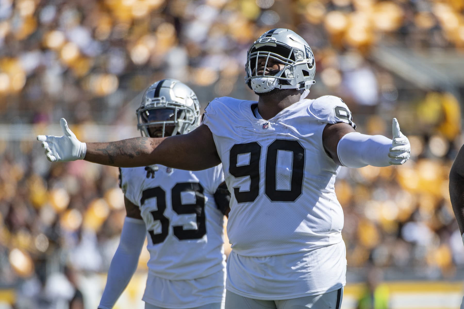 Las Vegas Raiders defensive tackle Johnathan Hankins (90) reacts after a defensive stop in the second half during an NFL football game, Sunday, Sept. 19, 2021, in Pittsburgh. (AP Photo/Justin Berl)