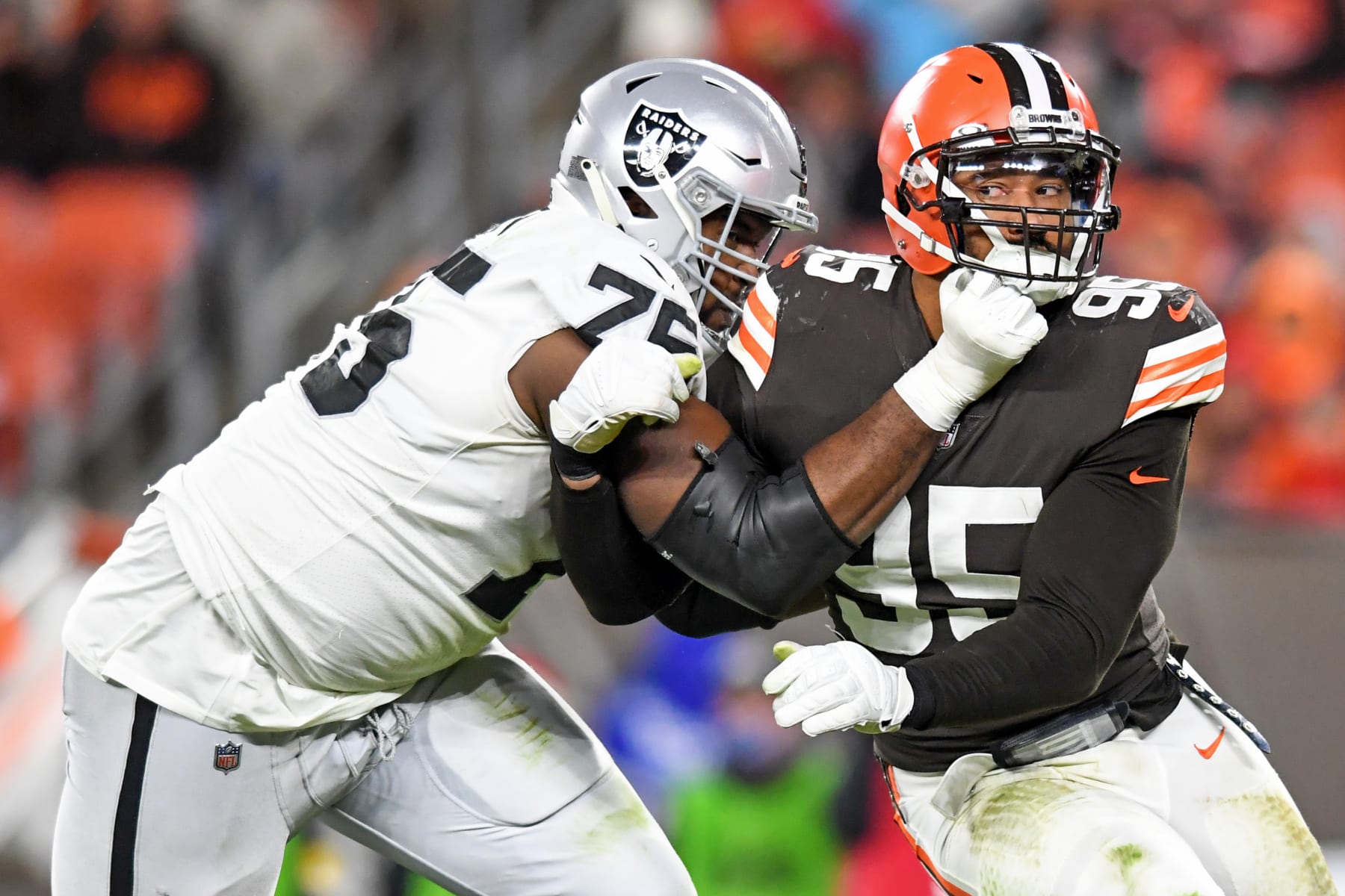 CLEVELAND, OH - DECEMBER 20: Myles Garrett #95 of the Cleveland Browns rushes against Brandon Parker #75 of the Las Vegas Raiders during the second half at FirstEnergy Stadium in Cleveland, Ohio. (Photo by Nick Cammett/Diamond Images via Getty Images)