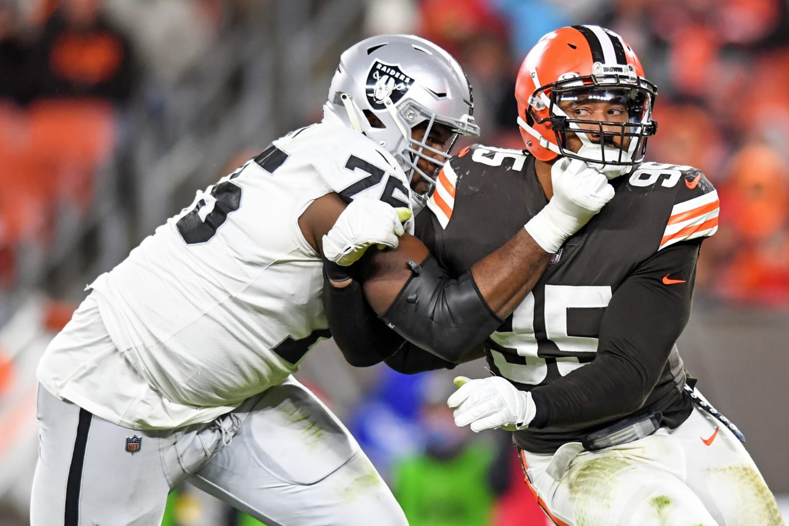 CLEVELAND, OH - DECEMBER 20: Myles Garrett #95 of the Cleveland Browns rushes against Brandon Parker #75 of the Las Vegas Raiders during the second half at FirstEnergy Stadium in Cleveland, Ohio. (Photo by Nick Cammett/Diamond Images via Getty Images)