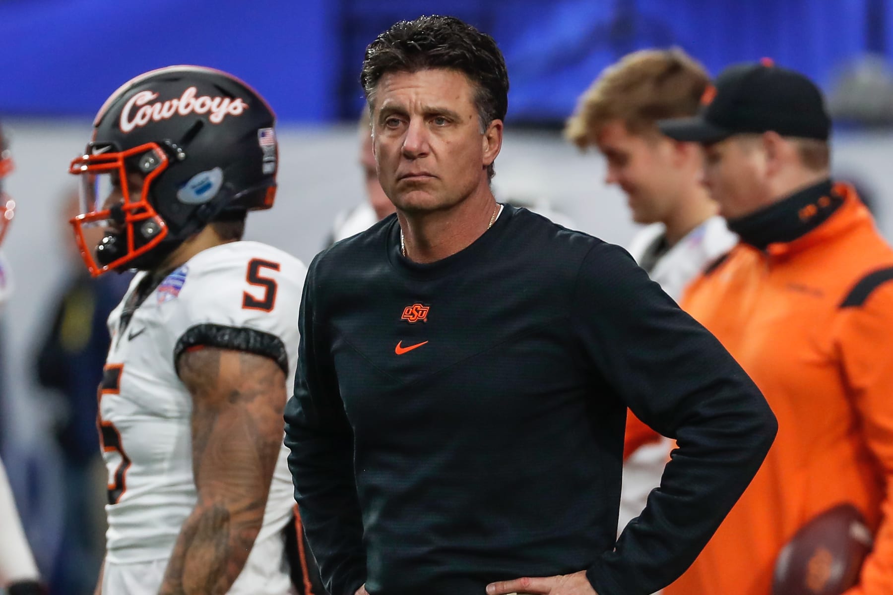 GLENDALE, AZ - JANUARY 01:  Oklahoma State Cowboys head coach MIke Gundy looks on before the PlayStation Fiesta Bowl college football bowl game between the Notre Dame Fighting Irish and the Oklahoma State Cowboys on January 1, 2022 at State Farm Stadium in Glendale, Arizona. (Photo by Kevin Abele/Icon Sportswire via Getty Images)