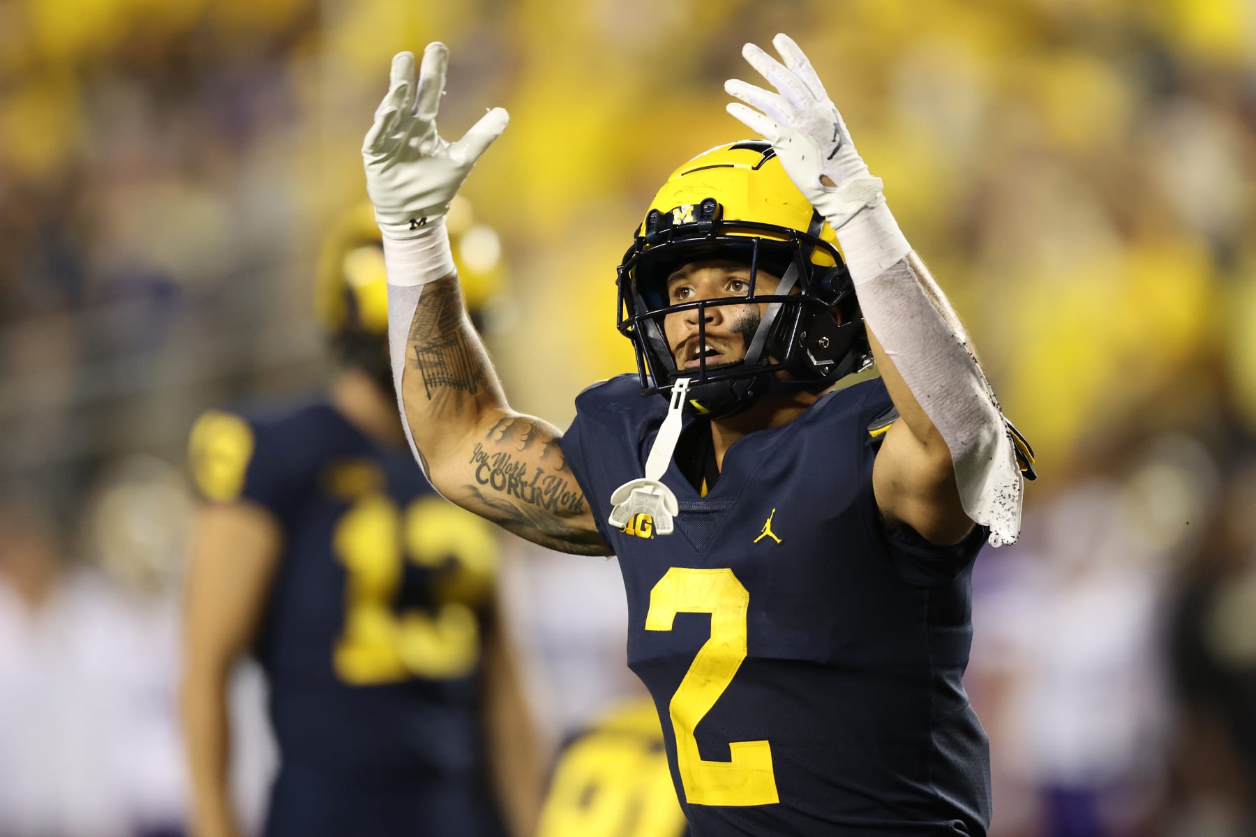 ANN ARBOR, MICHIGAN - SEPTEMBER 11: Blake Corum #2 of the Michigan Wolverines plays against the Washington Huskies at Michigan Stadium on September 11, 2021 in Ann Arbor, Michigan. (Photo by Gregory Shamus/Getty Images)
