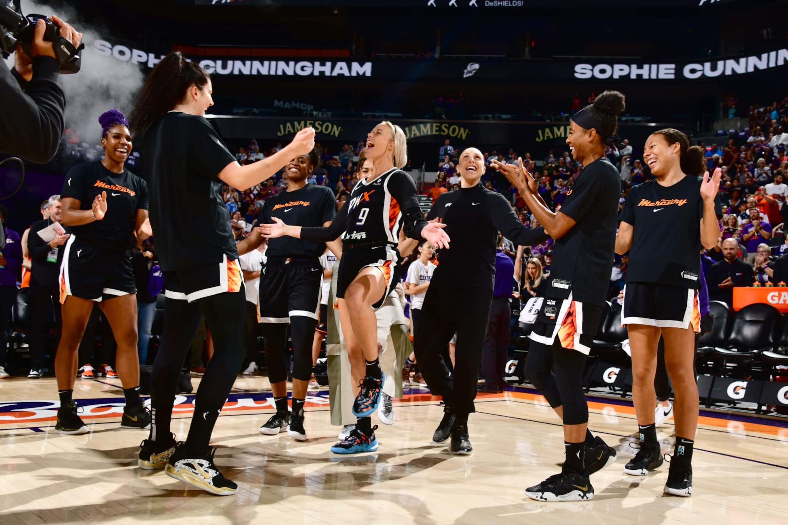 PHOENIX, AZ - AUGUST 14: Sophie Cunningham #9 of the Phoenix Mercury walks onto the court prior to the game against the Chicago Sky on August 14, 2022 at Footprint Center in Phoenix, Arizona. NOTE TO USER: User expressly acknowledges and agrees that, by downloading and or using this photograph, user is consenting to the terms and conditions of the Getty Images License Agreement. Mandatory Copyright Notice: Copyright 2022 NBAE (Photo by Barry Gossage/NBAE via Getty Images)