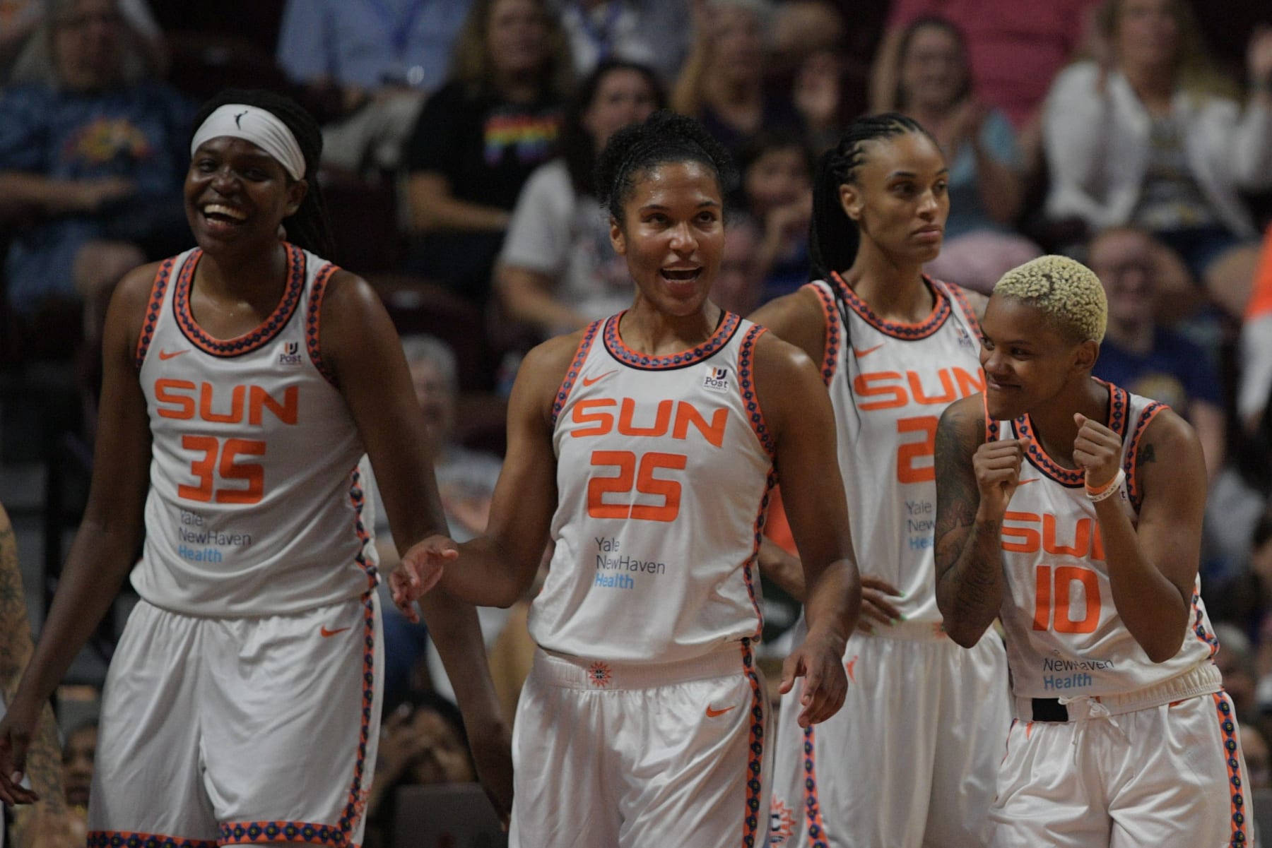 UNCASVILLE, CT - AUGUST 14: Connecticut Sun forward Alyssa Thomas (25) and Connecticut Sun guard Courtney Williams (10) dance to music while waiting for the outcome of a video review during a WNBA game between the Minnesota Lynx and the Connecticut Sun on August 14, 2022, at Mohegan Sun Arena in Uncasville, CT. (Photo by Erica Denhoff/Icon Sportswire via Getty Images)