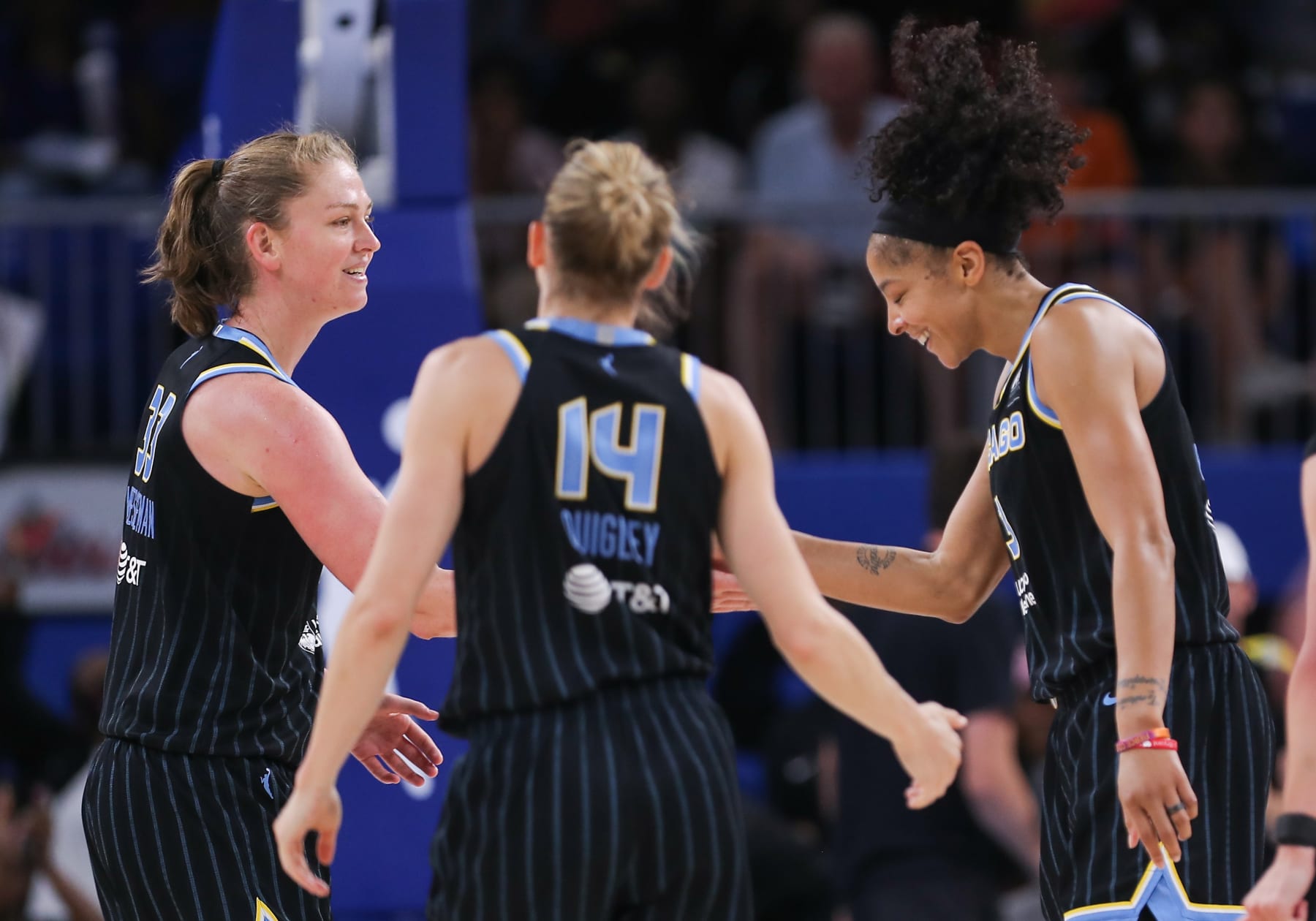 CHICAGO, IL - AUGUST 07: Chicago Sky forward Candace Parker (3) greets Chicago Sky forward Emma Meesseman (33) after making a three point basket during a WNBA game between the Connecticut Sun and the Chicago Sky on August 7, 2022, at Wintrust Arena in Chicago, IL. (Photo by Melissa Tamez/Icon Sportswire via Getty Images)