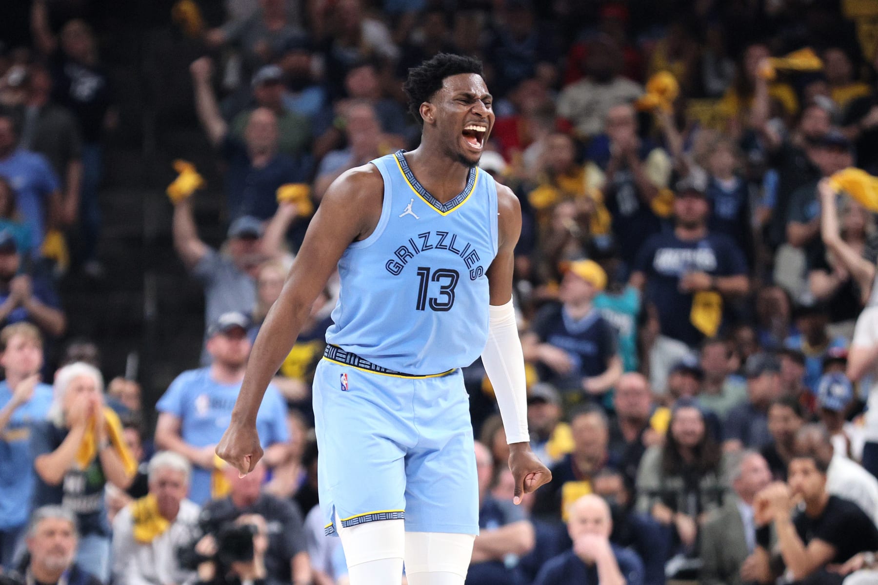 MEMPHIS, TENNESSEE - MAY 11: Jaren Jackson Jr. #13 of the Memphis Grizzlies celebrates a basket against the Golden State Warriors during the second quarter in Game Five of the 2022 NBA Playoffs Western Conference Semifinals at FedExForum on May 11, 2022 in Memphis, Tennessee. NOTE TO USER: User expressly acknowledges and agrees that, by downloading and/or using this photograph, User is consenting to the terms and conditions of the Getty Images License Agreement. (Photo by Andy Lyons/Getty Images)