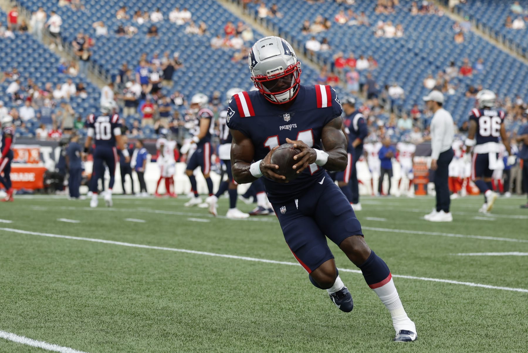 FOXBOROUGH, MA - AUGUST 11: New England Patriots wide receiver Ty Montgomery (14) carries the ball in warm up before an NFL preseason game between the New England Patriots and the New York Giants on August 11, 2022, at Gillette Stadium in Foxborough, Massachusetts. (Photo by Fred Kfoury III/Icon Sportswire via Getty Images)