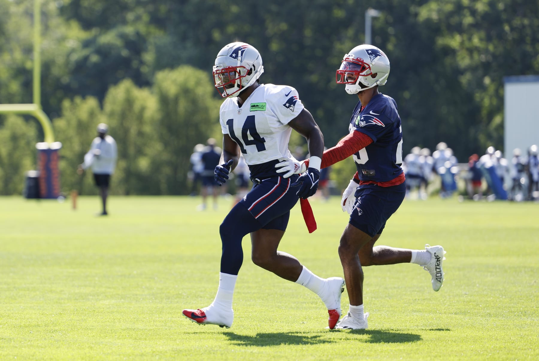 FOXBOROUGH, MA - JULY 30: New England Patriots wide receiver Ty Montgomery (14) escapes during day 4 of New England Patriots training camp on July 30, 2022, at the Patriots Training Facility at Gillette Stadium in Foxborough, Massachusetts. (Photo by Fred Kfoury III/Icon Sportswire via Getty Images)