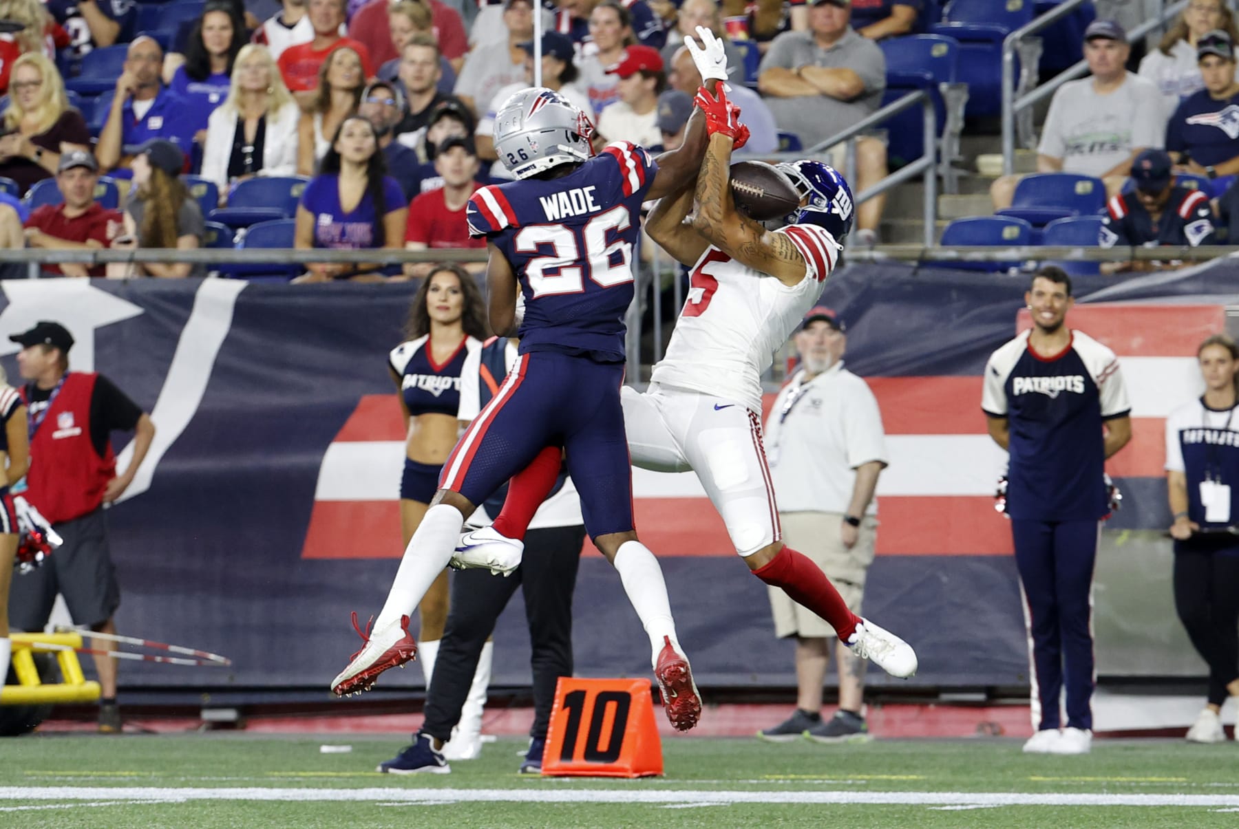 FOXBOROUGH, MA - AUGUST 11: New England Patriots cornerback Shaun Wade (26) breaks up the pass for New York Giants wide receiver Keelan Doss (5) during an NFL preseason game between the New England Patriots and the New York Giants on August 11, 2022, at Gillette Stadium in Foxborough, Massachusetts. (Photo by Fred Kfoury III/Icon Sportswire via Getty Images)