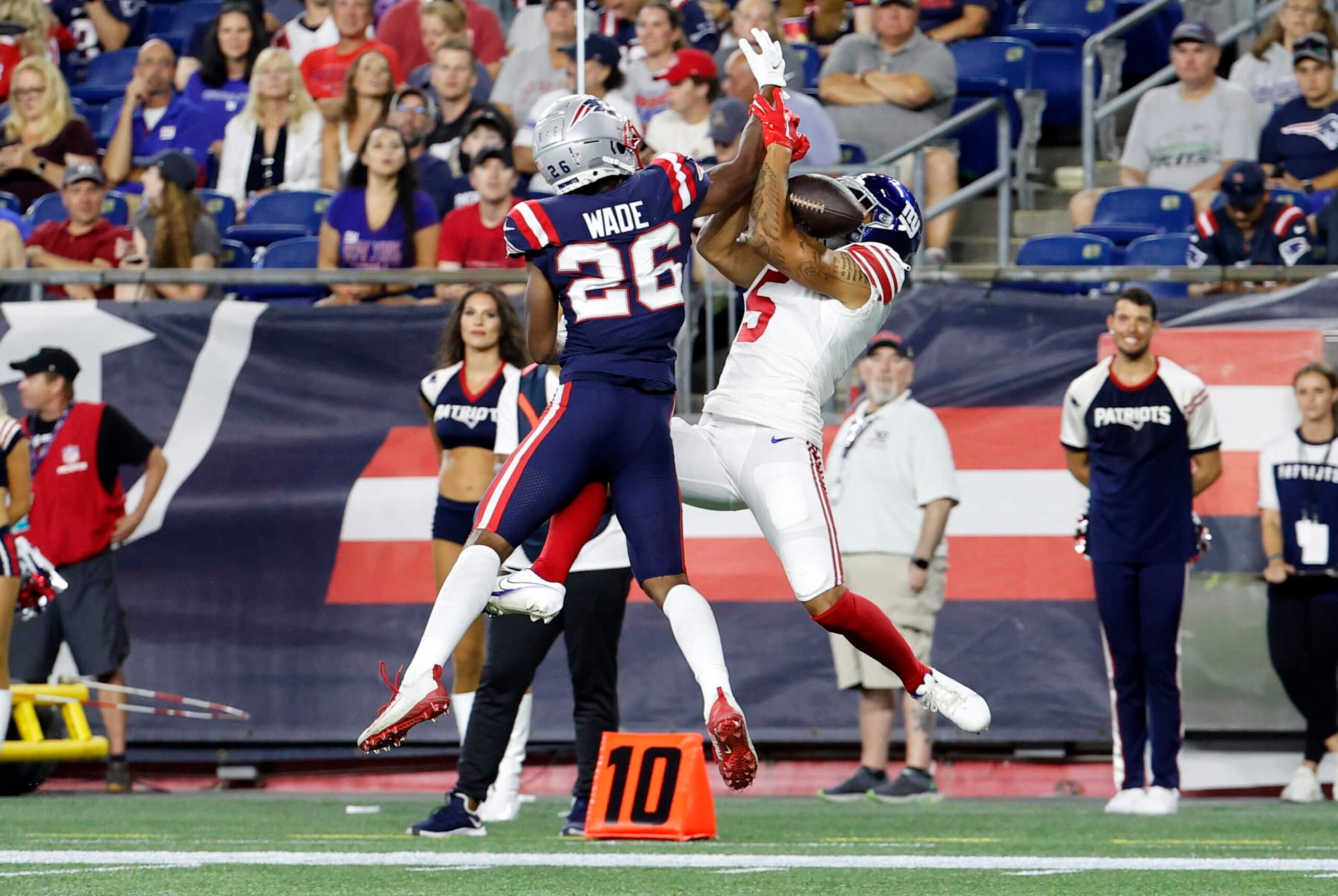 FOXBOROUGH, MA - AUGUST 11: New England Patriots cornerback Shaun Wade (26) breaks up the pass for New York Giants wide receiver Keelan Doss (5) during an NFL preseason game between the New England Patriots and the New York Giants on August 11, 2022, at Gillette Stadium in Foxborough, Massachusetts. (Photo by Fred Kfoury III/Icon Sportswire via Getty Images)