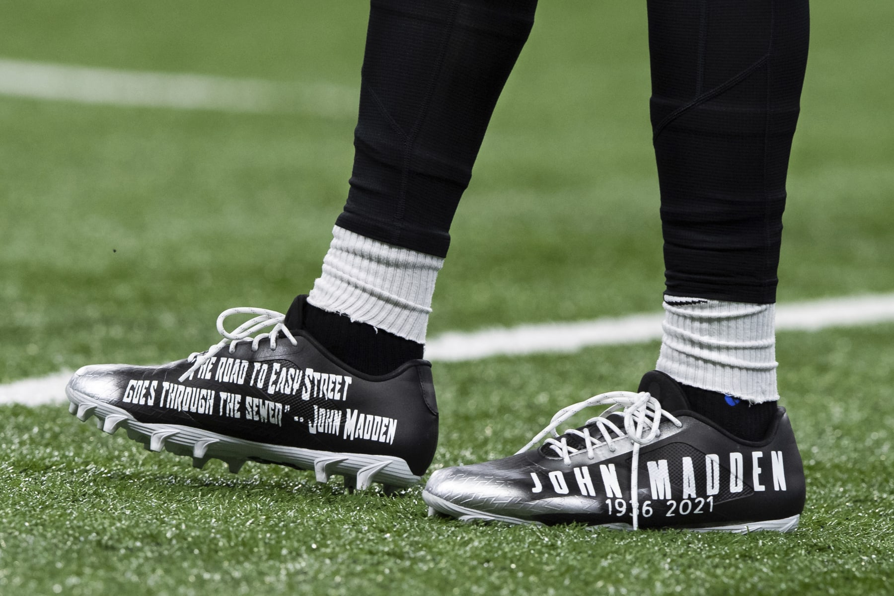 Las Vegas Raiders wide receiver DeSean Jackson (1) wears custom cleats honoring John Madden during an NFL football game against the Indianapolis Colts, Sunday, Jan. 2, 2022, in Indianapolis. (AP Photo/Zach Bolinger)
