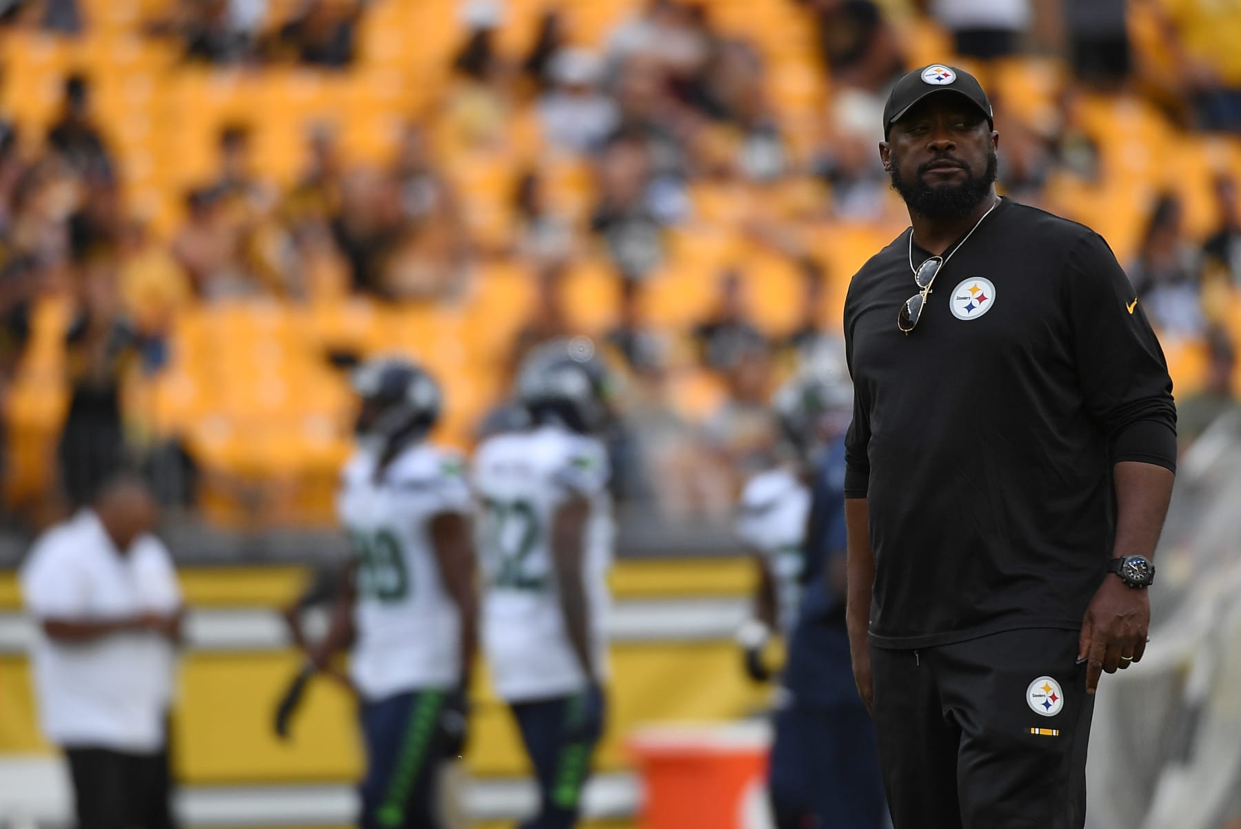 PITTSBURGH, PA - AUGUST 13: Head Coach Mike Tomlin of the Pittsburgh Steelers looks on during warmups before a preseason game against the Seattle Seahawks at Acrisure Stadium on August 13, 2022 in Pittsburgh, Pennsylvania. (Photo by Justin Berl/Getty Images)