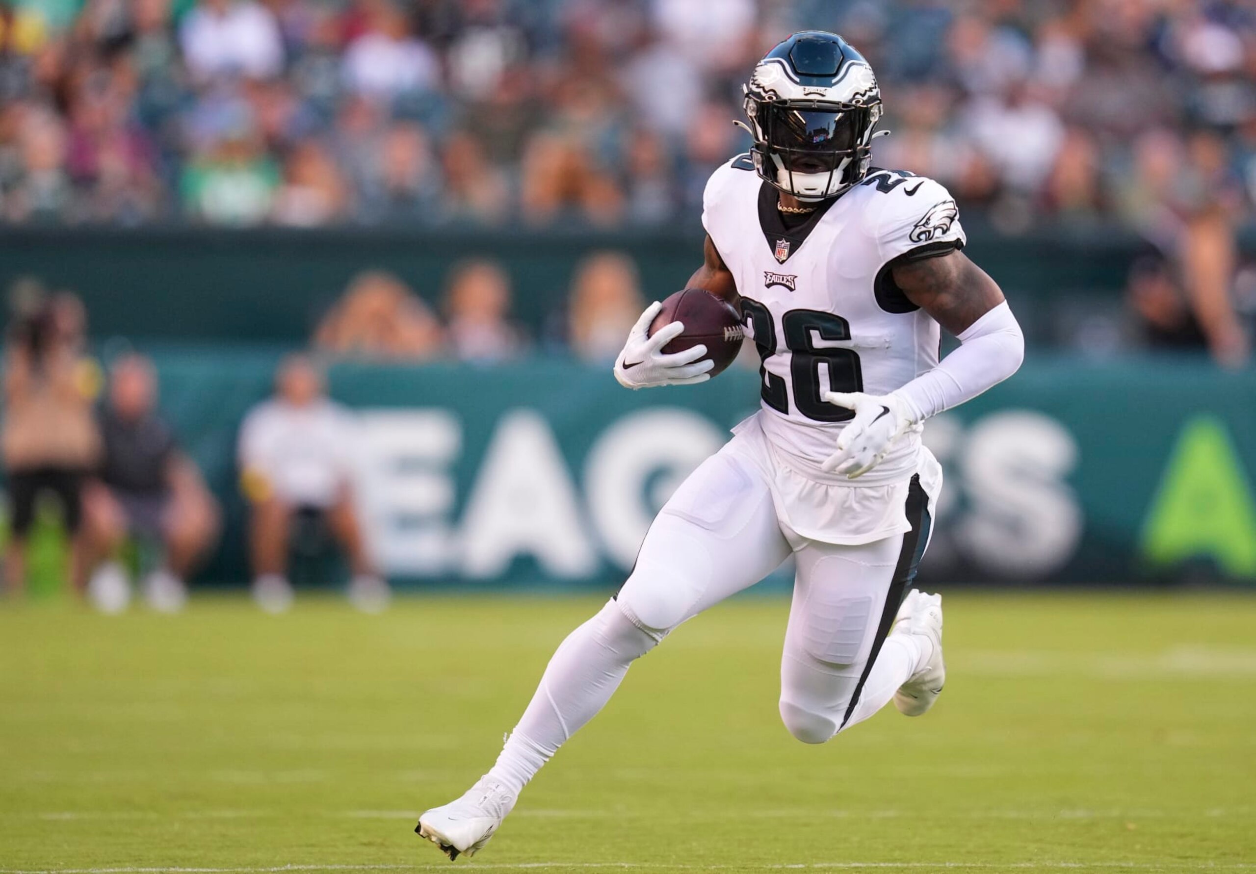 PHILADELPHIA, PA - AUGUST 12: Miles Sanders #26 of the Philadelphia Eagles runs with the ball against the New York Jets during the preseason game at Lincoln Financial Field on August 12, 2022 in Philadelphia, Pennsylvania. The Jets defeated the Eagles 24-21. (Photo by Mitchell Leff/Getty Images) PHILADELPHIA, PA - AUGUST 12: Miles Sanders #26 of the Philadelphia Eagles runs with the ball against the New York Jets during the preseason game at Lincoln Financial Field on August 12, 2022 in Philadelphia, Pennsylvania. The Jets defeated the Eagles 24-21. (Photo by Mitchell Leff/Getty Images)