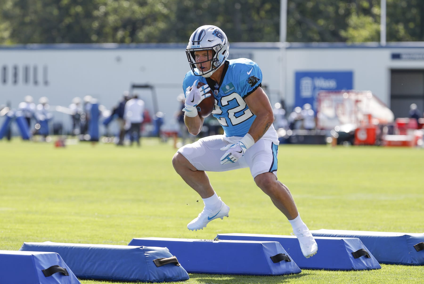 FOXBOROUGH, MA - AUGUST 16: Carolina Panthers running back Christian McCaffrey (22) runs the speed bumps during a joint practice between the New England Patriots and the Carolina Panthers on August 16, 2022, at the Patriots Practice Facility at Gillette Stadium in Foxborough, Massachusetts. (Photo by Fred Kfoury III/Icon Sportswire via Getty Images)
