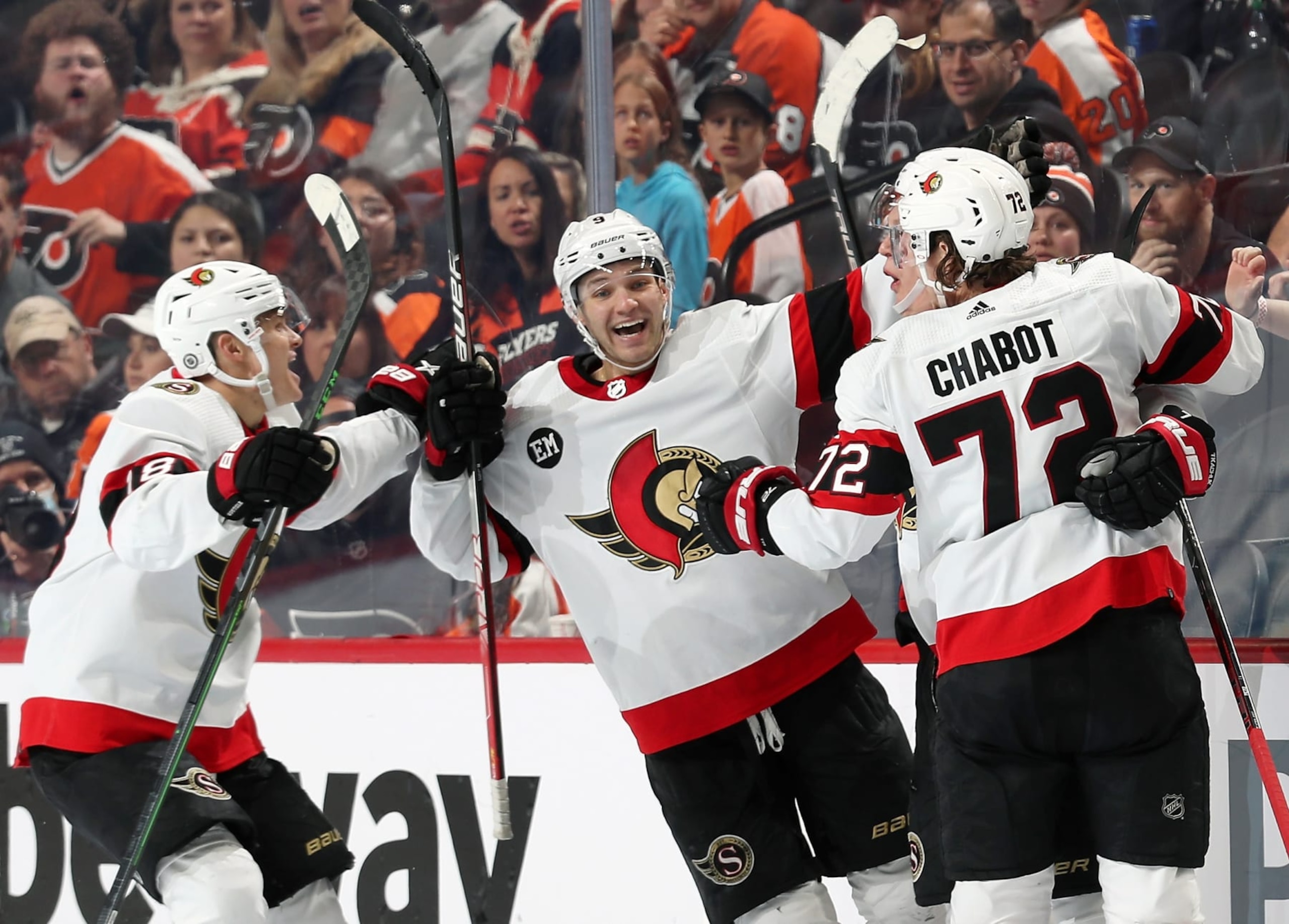 PHILADELPHIA, PA - APRIL 29:  Brady Tkachuk #7 of the Ottawa Senators celebrates his third period powerplay game winning goal with teammates Josh Norris #9, Tim Stutzle #18 and Thomas Chabot #72 against the Philadelphia Flyers at the Wells Fargo Center on April 29, 2022 in Philadelphia, Pennsylvania.  The Senators defeated the Flyers 4-2.  (Photo by Len Redkoles/NHLI via Getty Images)