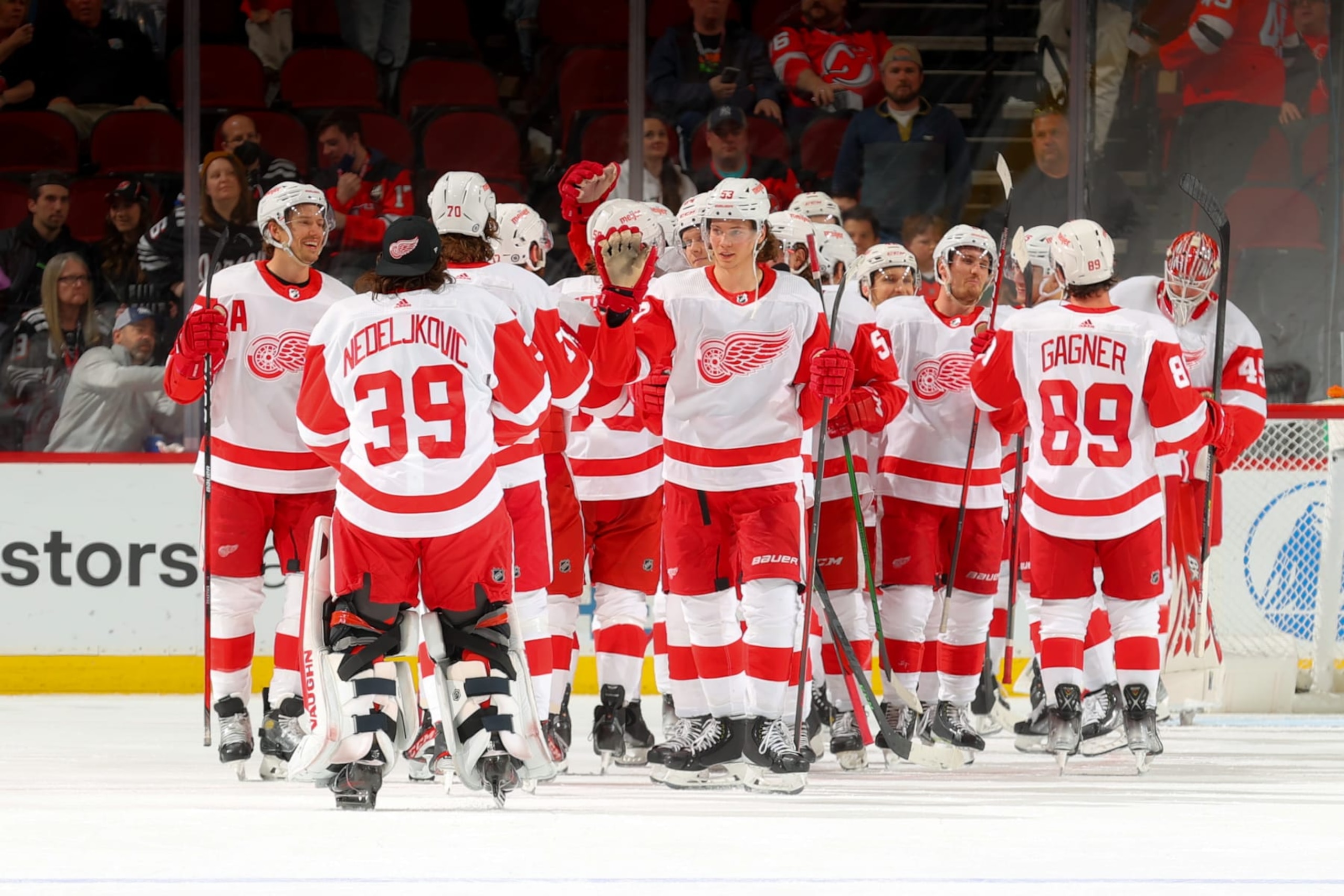 NEWARK, NJ - APRIL  29:  The Detroit Red Wings celebrates after defeating the New Jersey Devils on April 29, 2022 at the Prudential Center in Newark, New Jersey.  (Photo by Rich Graessle/Getty Images)