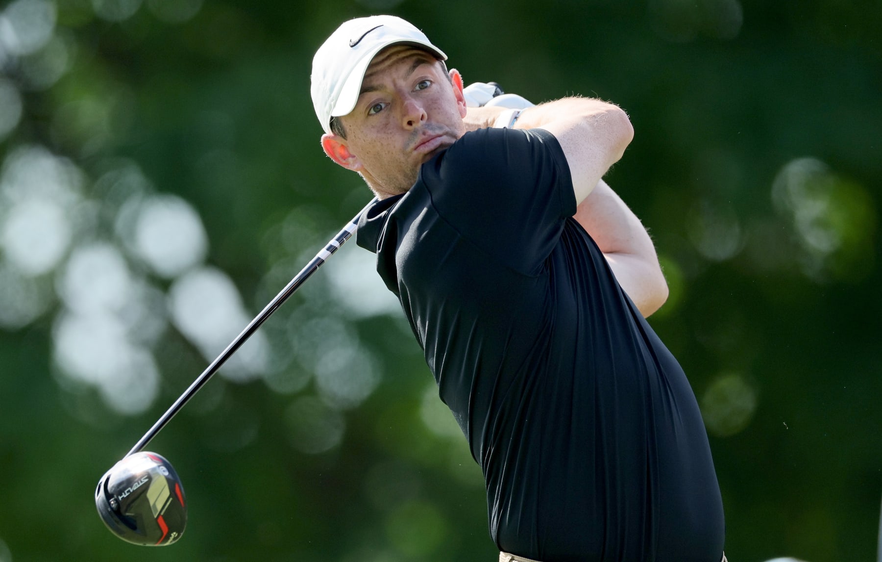 WILMINGTON, DELAWARE - AUGUST 17:   Rory McIlroy of Northern Ireland hits a shot on the 9th hole during the Pro-Am prior to the BMW Championship at Wilmington Country Club on August 17, 2022 in Wilmington, Delaware. (Photo by Andy Lyons/Getty Images)