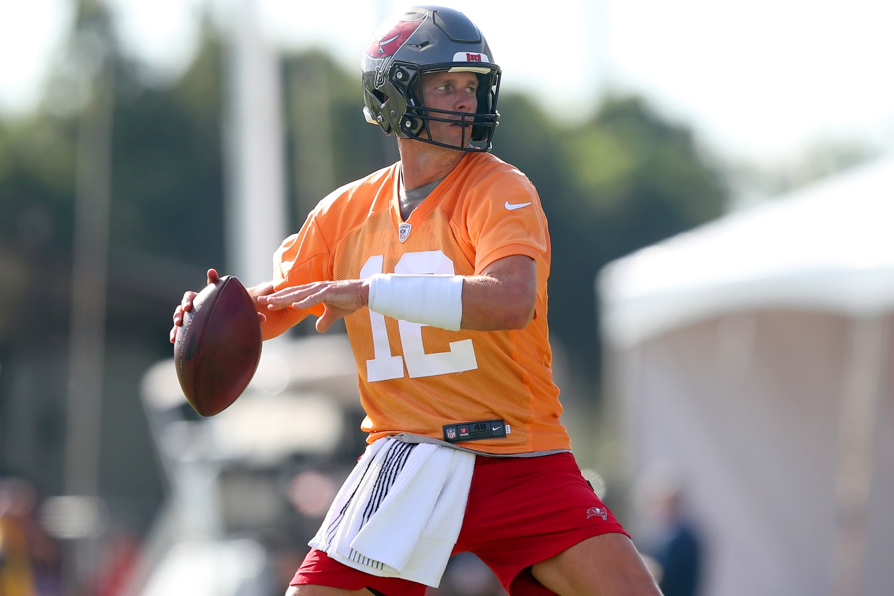 TAMPA, FL - JUL 30: Tampa Bay Buccaneers quarterback Tom Brady (12) throws a pass during the Tampa Bay Buccaneers Training Camp on July 30, 2022 at the AdventHealth Training Center at One Buccaneer Place in Tampa, Florida. (Photo by Cliff Welch/Icon Sportswire via Getty Images)